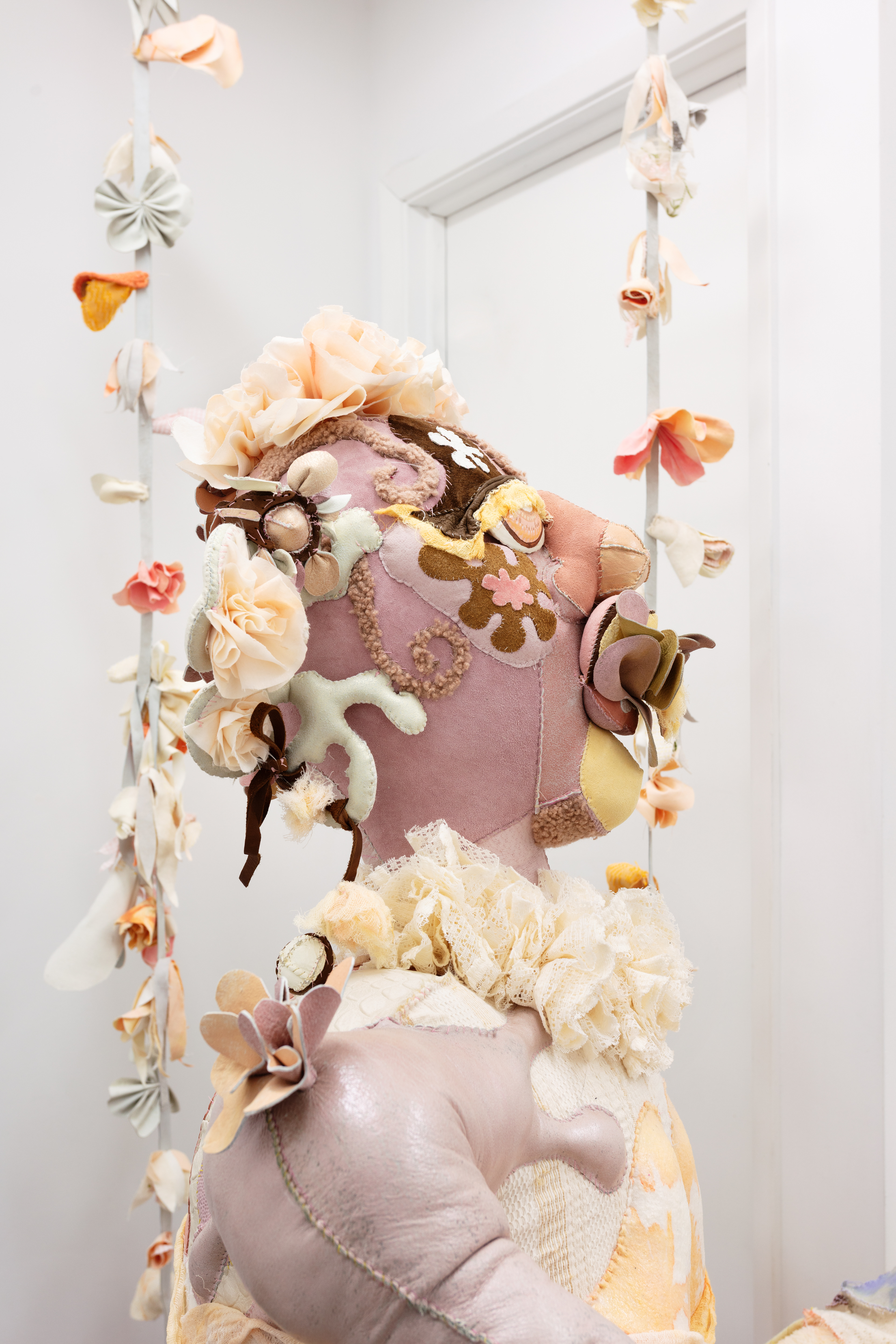 Delight, 2020. Various recycled and hand dyed fabrics, recycled leather, cotton and recycled polyester batting, acrylic paint, PVA glue, seashells, stones, beads, pipe, wooden chair, hand sewn. 52 x 36 x 36 in (132.1 x 91.4 x 91.4 cm).
