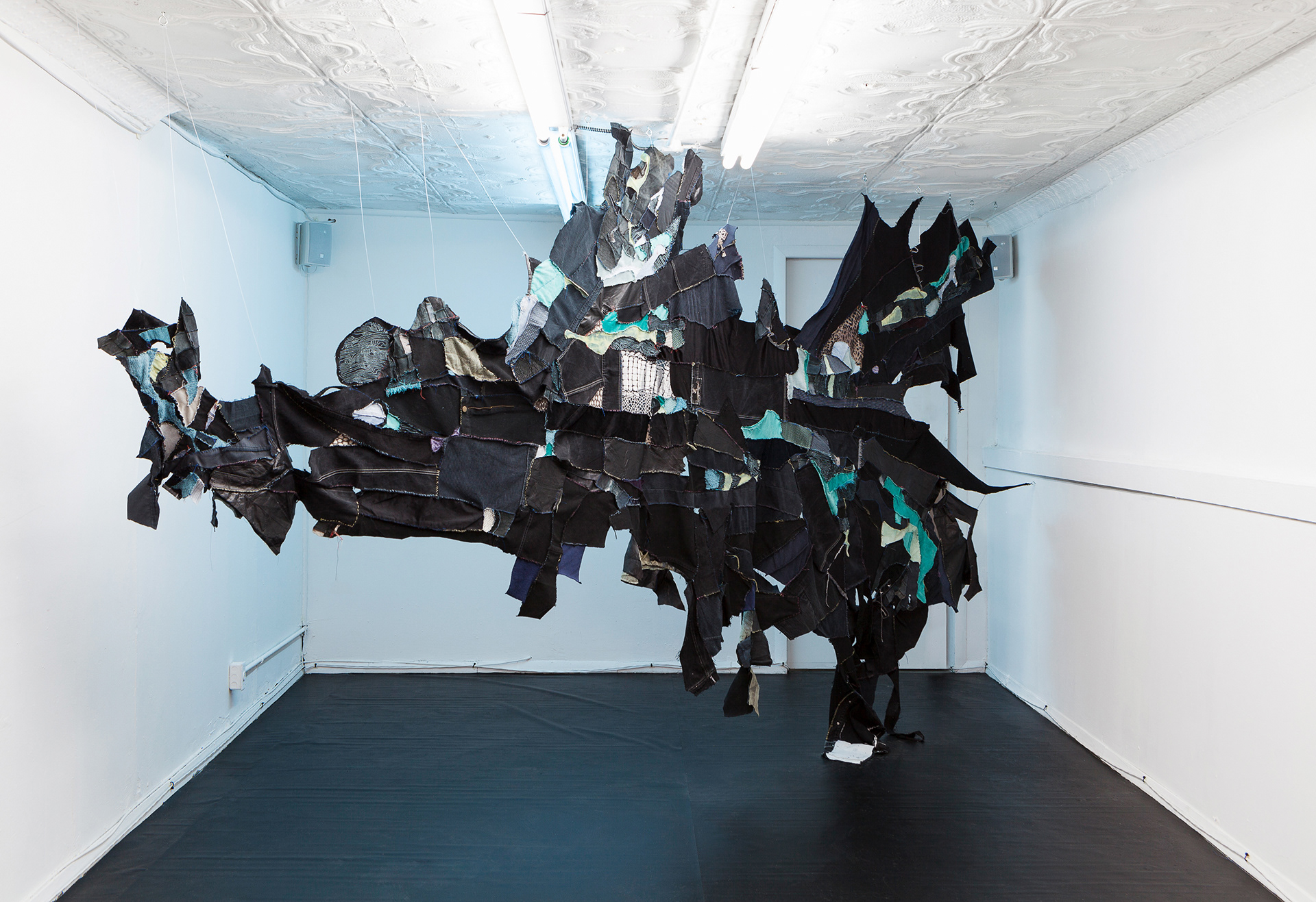 the sighting of the last shadow dweller (original sea kin), 2018. Hand sewn recycled fabrics and leathers. Dimensions variable.