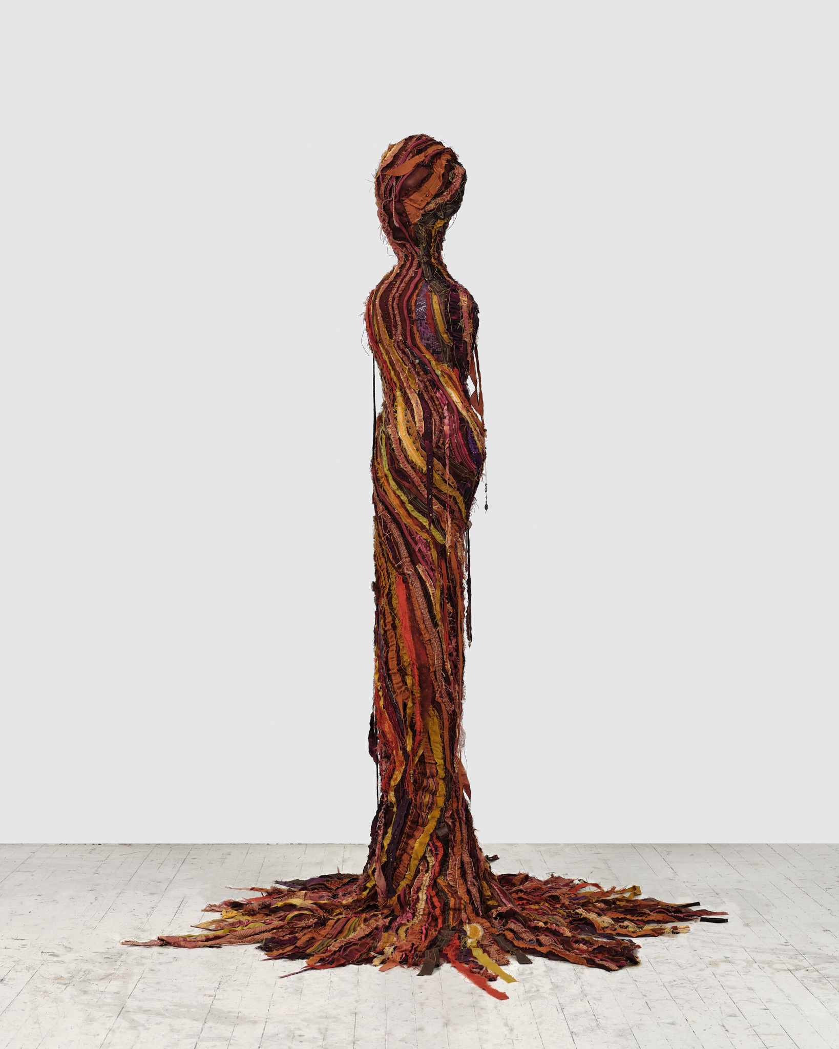 Blaze, 2024, Steel, enamel paint, acrylic paint and finisher, repurposed leather and fabric, assorted beads and found objects, seashells, and coated nylon thread, 73 1/2H x 49 x 50 1/2 inches