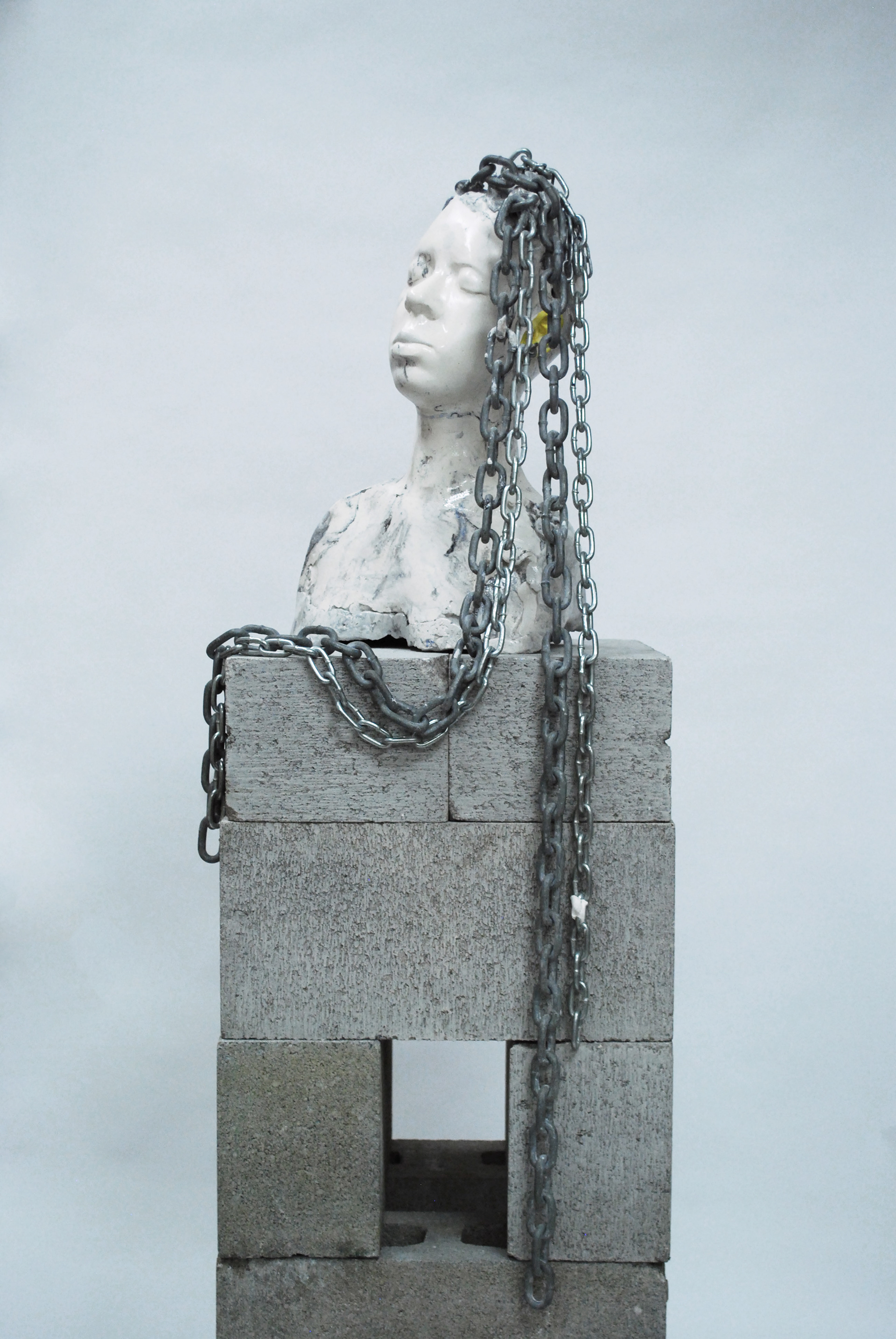 Georgia marble marks slave burial sites across America (detail), 2016. Plaster, cement, acrylic paint, chain, and high-gloss finish, 18 1/2 x 12 1/2 x 8 1/2 inches.