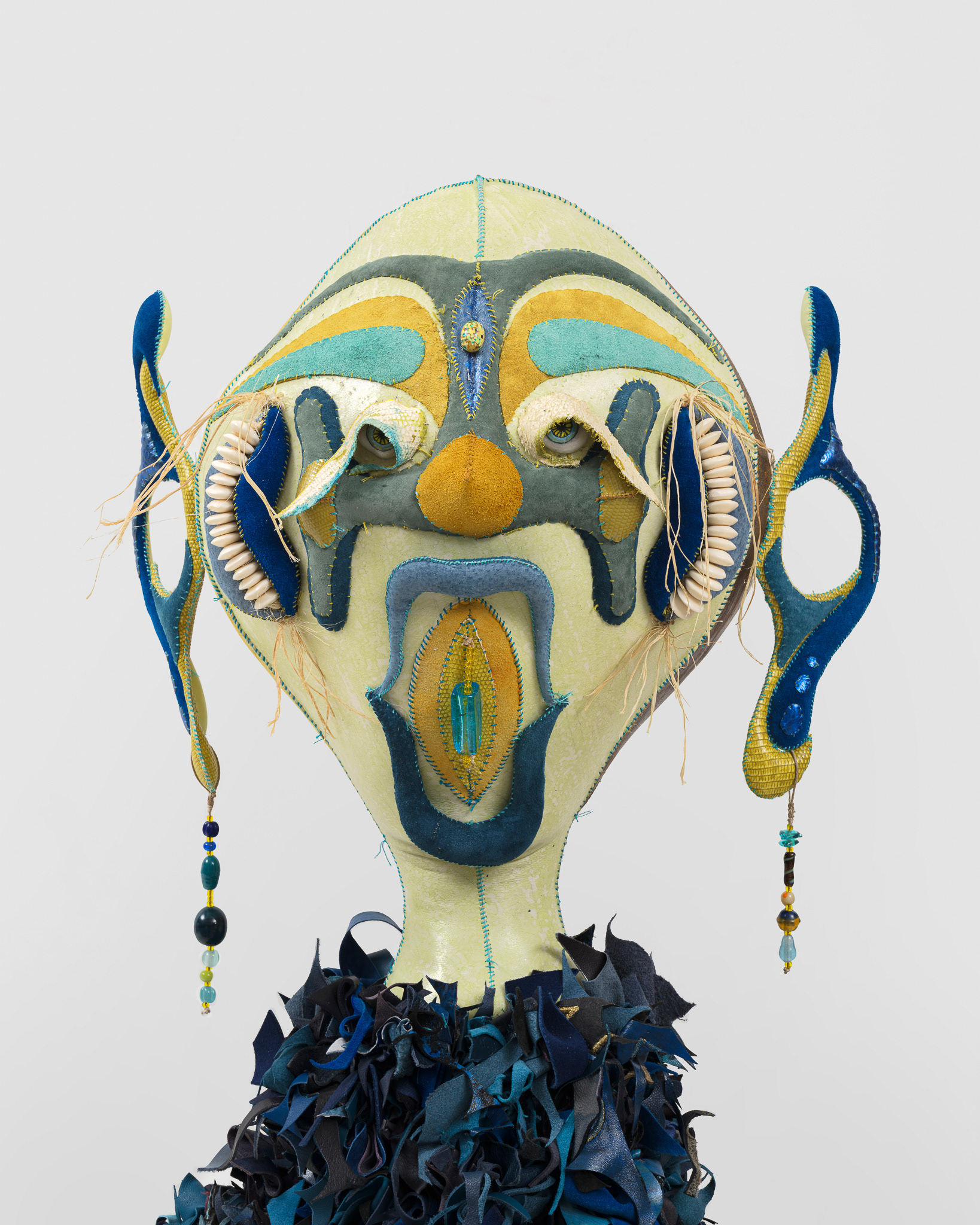 (detail) The Siren of Amazonis Planitia, 2023, Steel, wood, enamel paint, acrylic paint, leather dye and finisher, repurposed leather and suede, stones, ox bone beads and assorted found beads, twine, and coated nylon thread, 65 1/2H x 16 x 16 inches