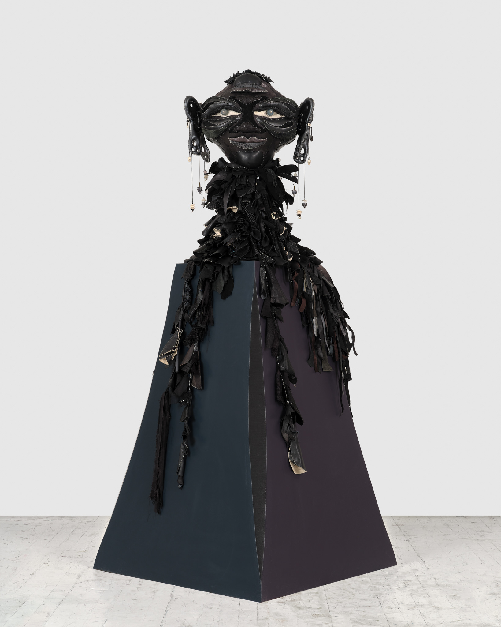 Lilitu, 2024, Steel, wood, enamel paint, repurposed leather, suede and fabric, leather dye, assorted beads, leather cord, wire, and coated nylon thread, 71 H x 32 x 32 inches
