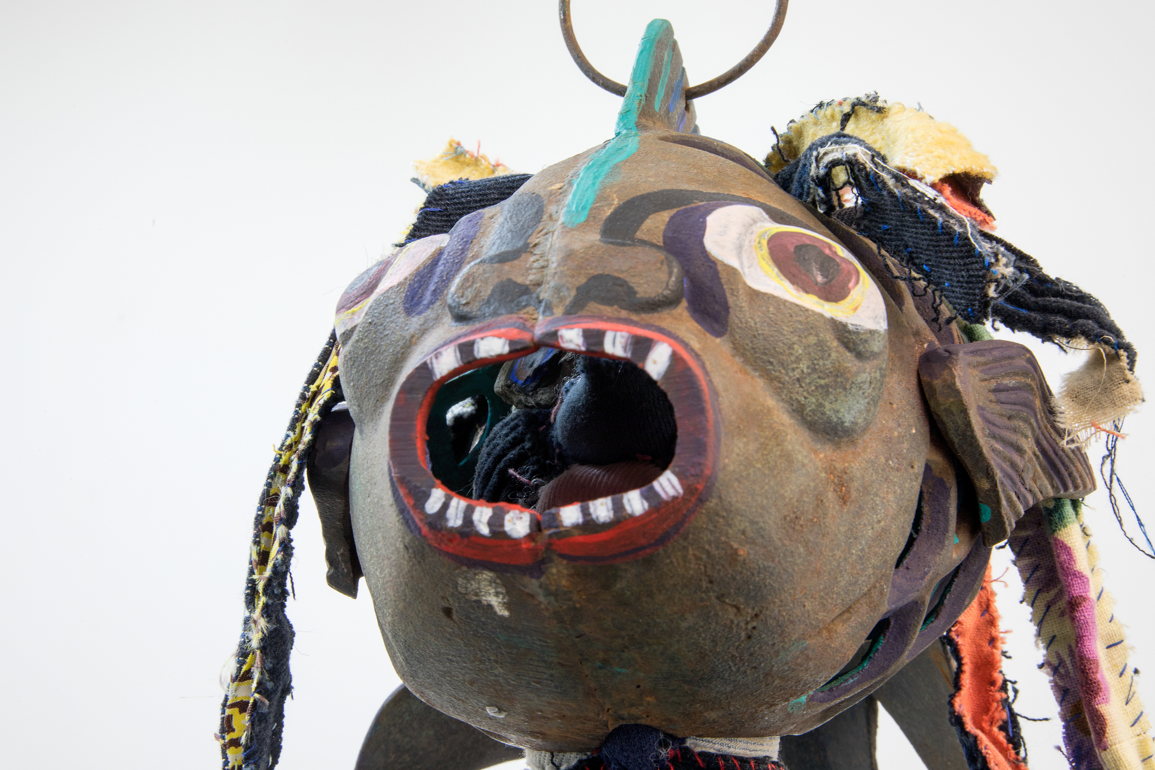the first breath we took together as one negro fish, 2018. Fabric, leather, lantern, seashells, acrylic paint, stones, human hair, jute. Dimensions variable.