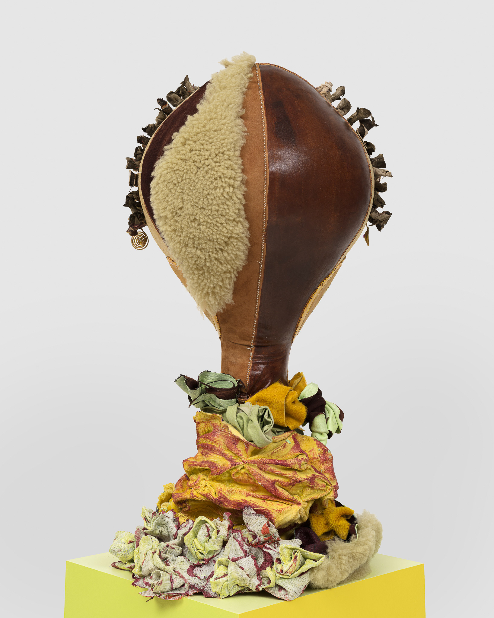 (detail) Mercurial Virgin, 2023, Steel, wood, enamel paint, acrylic paint, leather dye and finisher, repurposed leather and suede, stones, ox bone beads and assorted found beads, twine, and coated nylon thread, 65 1/2H x 16 x 16 inches