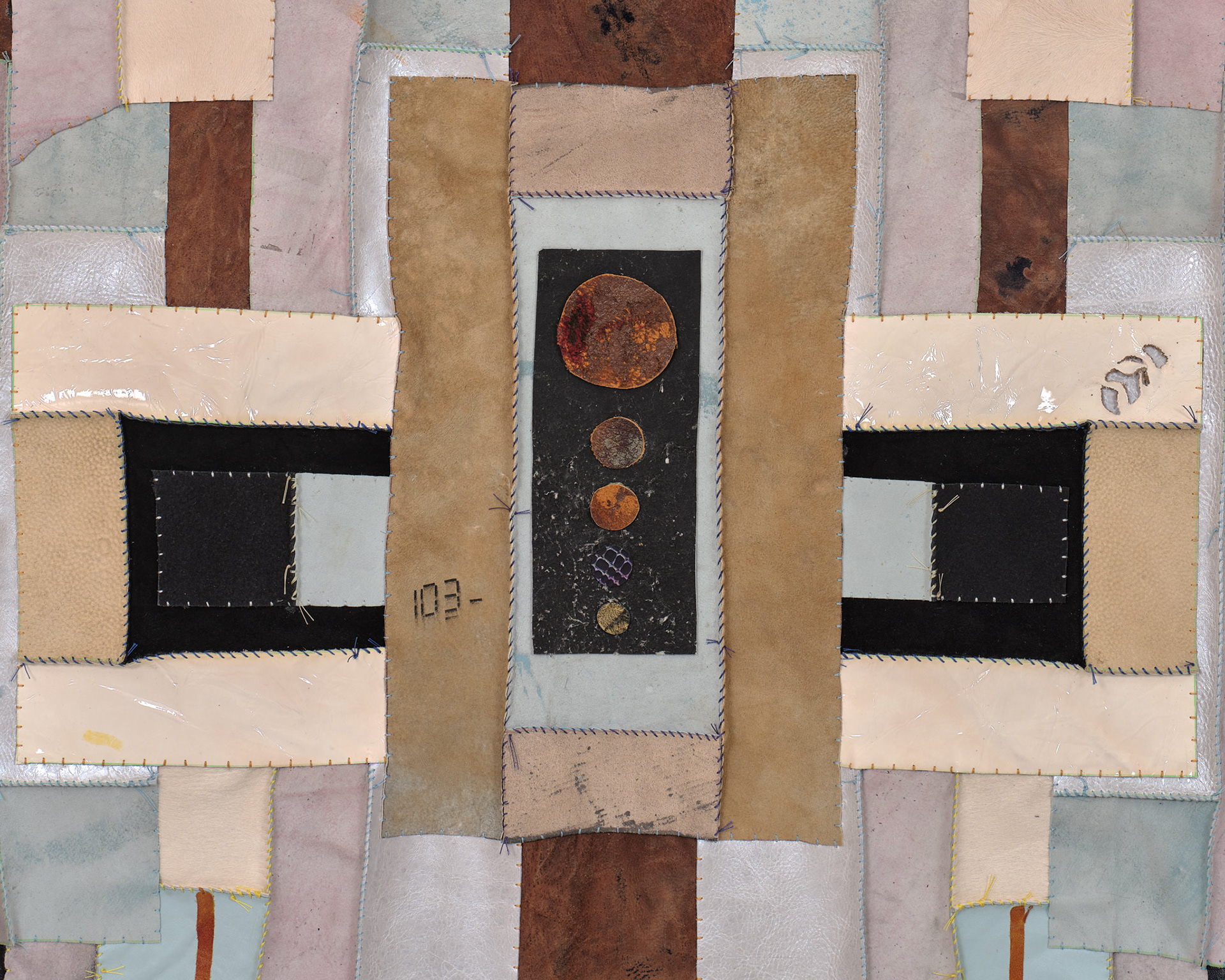 (detail) Gravity, 2024, Repurposed leather and suede, acrylic paint and finisher, leather dye, upholstery tacks, and coated nylon thread, 100H x 47 3/8 inches