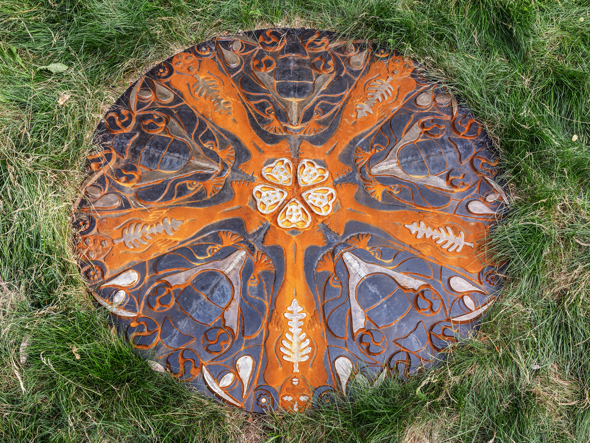 We watched humankind evolve as we absorbed into the sea floor, the moon stared down at us and told us the Earth had a heavy heart, 2022. Cast Iron, Enamel Paint. 72 x 72 x 1.25 inches.