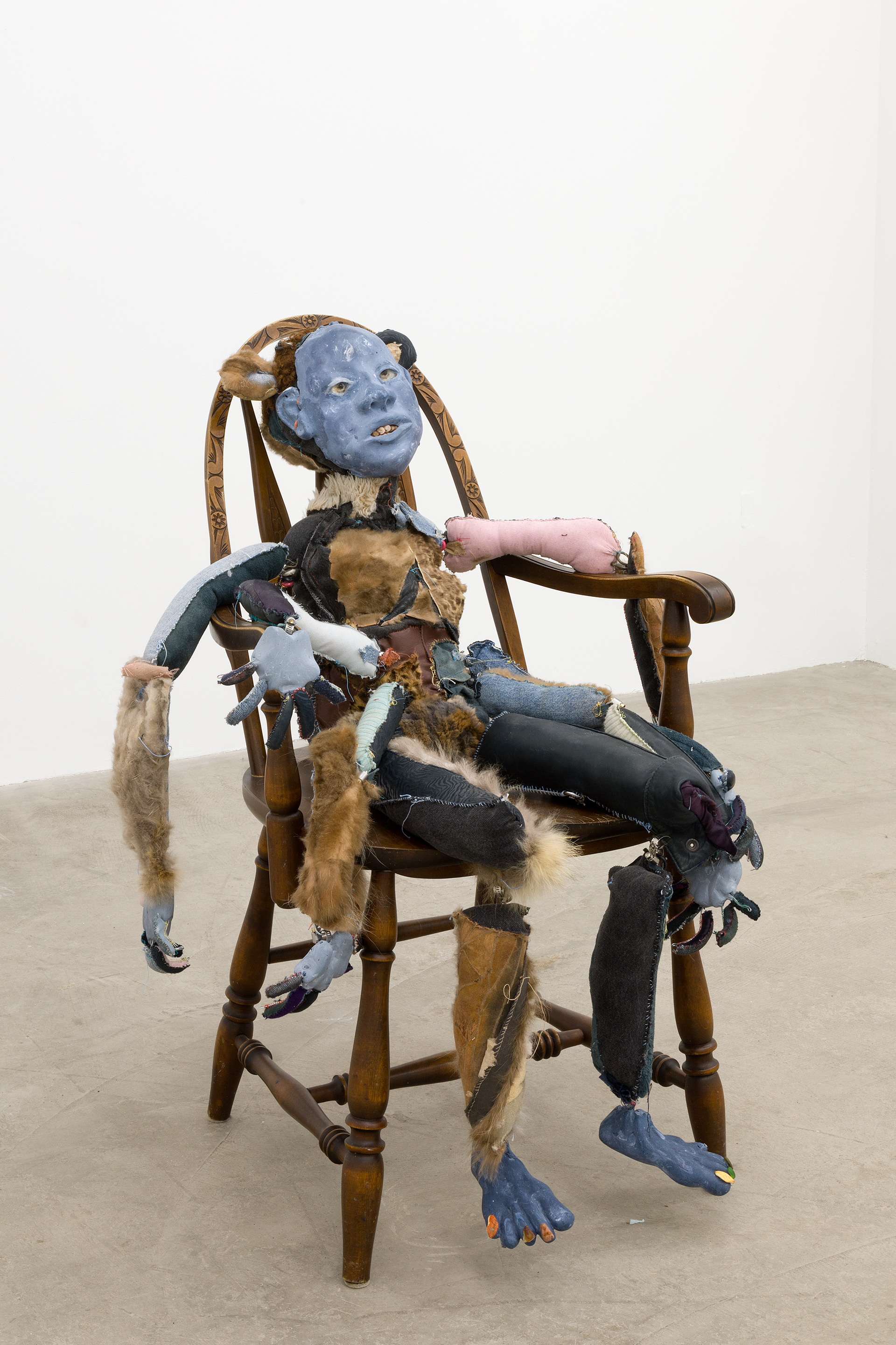 Unity (Negros Historical Information Systems in Every Dark Corner). 2018. Hand carved plaster, wire, hand sewn fur, leather, fabric, seashells, stones, cotton batting, polyester batting, human hair, acrylic paint, chalk pastel. Dimensions variable.