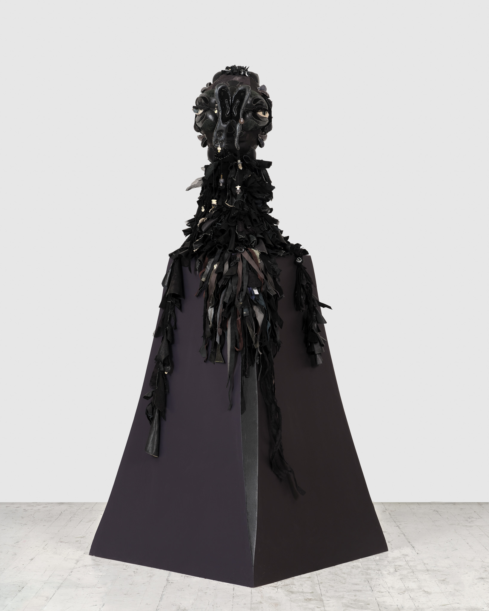 Lilitu, 2024, Steel, wood, enamel paint, repurposed leather, suede and fabric, leather dye, assorted beads, leather cord, wire, and coated nylon thread, 71 H x 32 x 32 inches