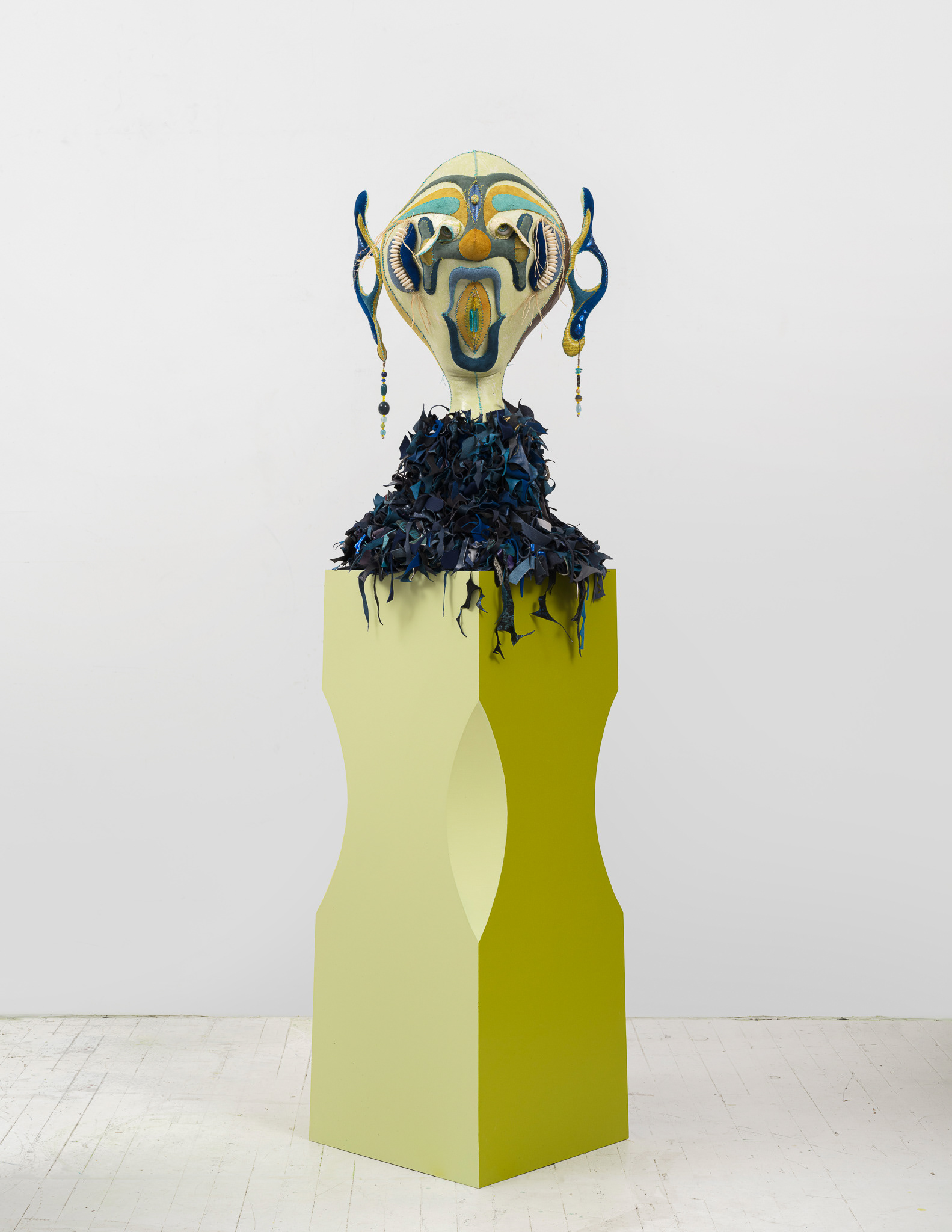 The Siren of Amazonis Planitia, 2023, Steel, wood, enamel paint, acrylic paint, leather dye and finisher, repurposed leather and suede, stones, ox bone beads and assorted found beads, twine, and coated nylon thread, 65 1/2H x 16 x 16 inches