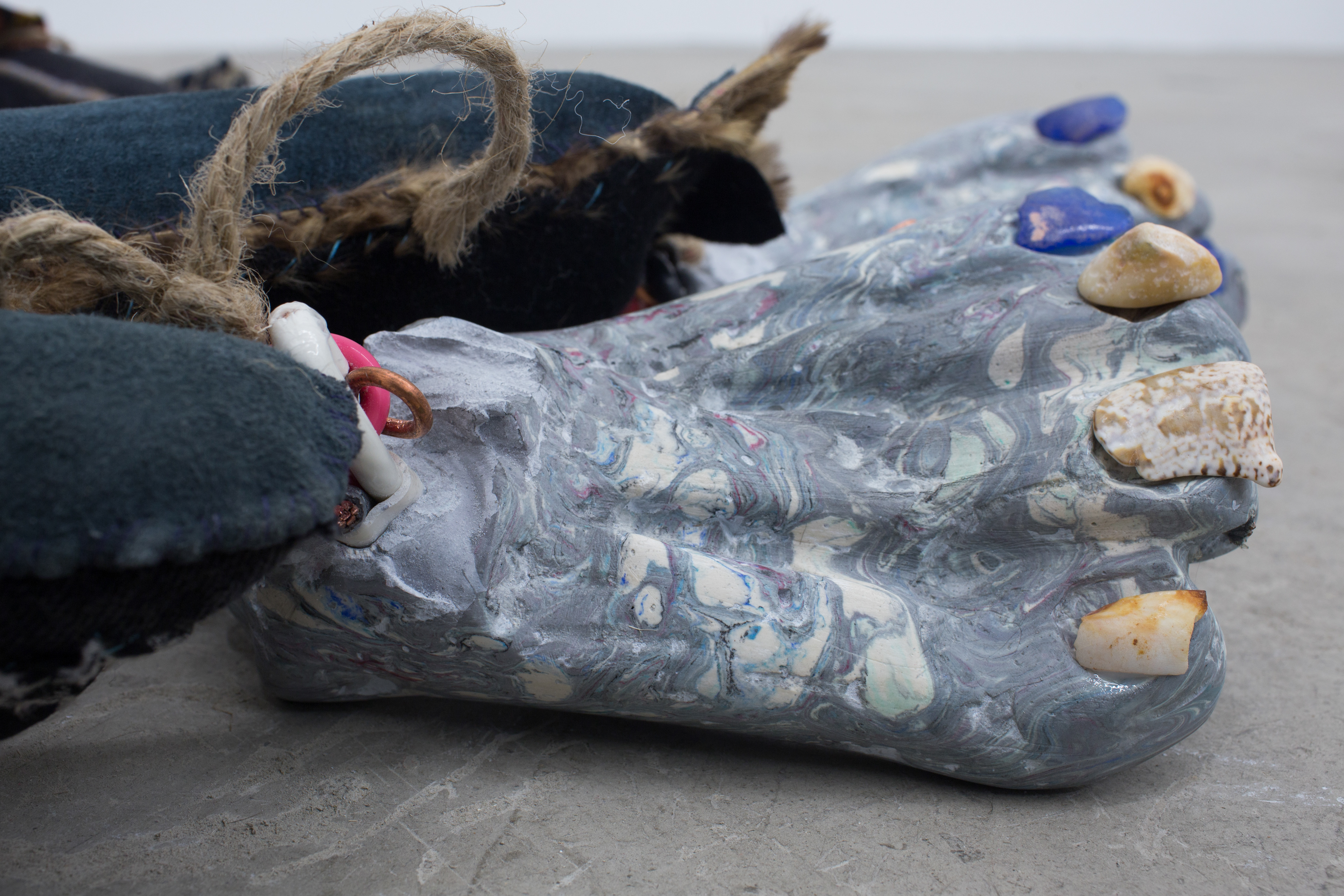 Seashell, 2018. Hand sewn fabrics, furs and leathers, hand carved plaster, acrylic paint, wire, stones, jute, hardware, sea shells, sea stones. 25 x 16 x 20 in (63.5 x 40.6 x 50.8 cm).