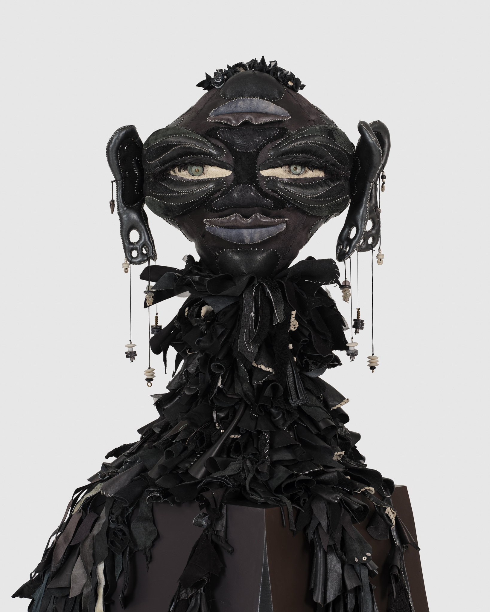 (detail) Lilitu, 2024, Steel, wood, enamel paint, repurposed leather, suede and fabric, leather dye, assorted beads, leather cord, wire, and coated nylon thread, 71 H x 32 x 32 inches
