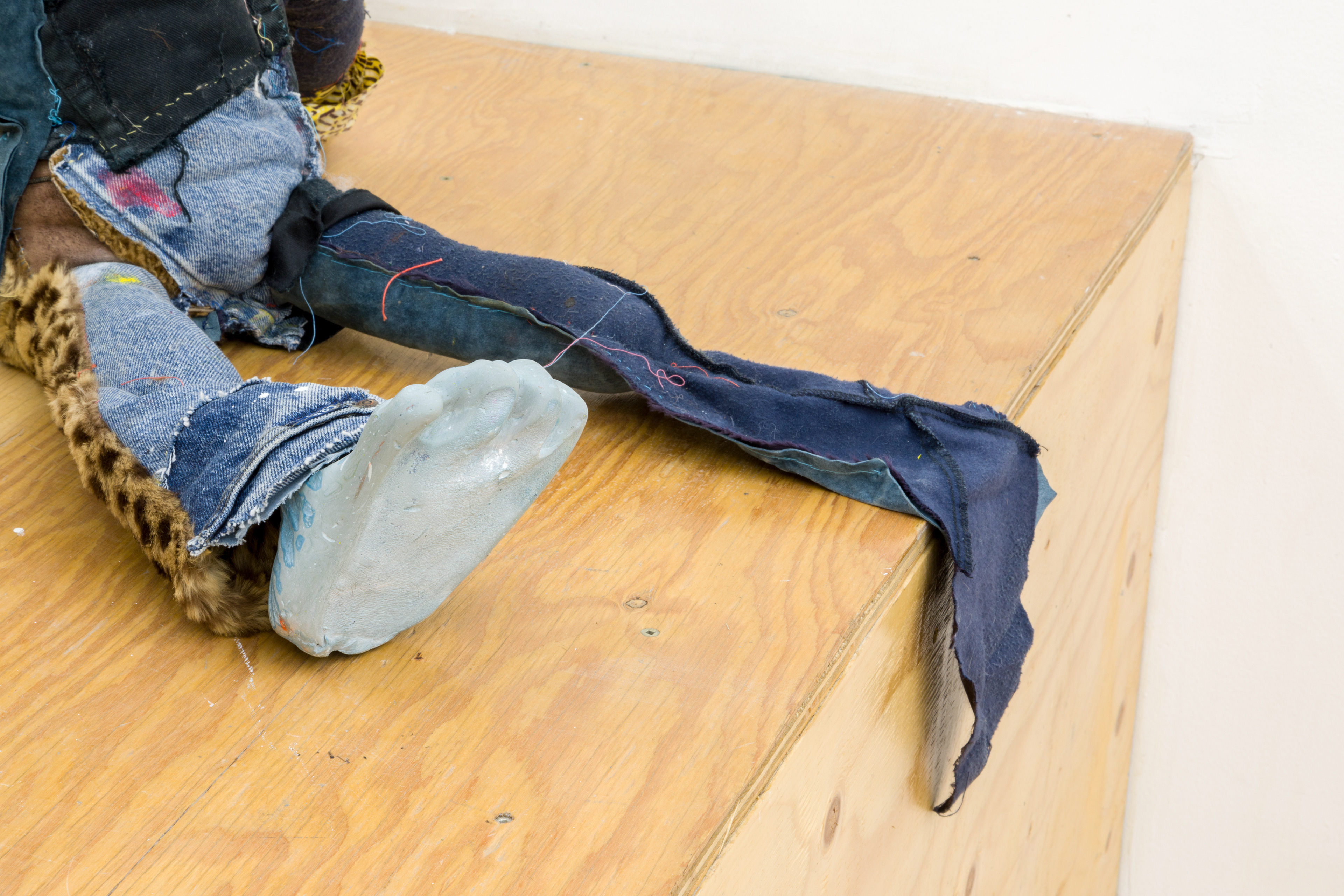'friendliness and the whisperers', 2018. Hand sewn fabrics, furs and leathers, hand carved plaster, acrylic paint, chalk pastel, wires, hardware, cotton batting, polyester batting, human hair, sea shells, stones. 21 x 40 x 28 in (53.3 x 101.6 x 71.1 cm).