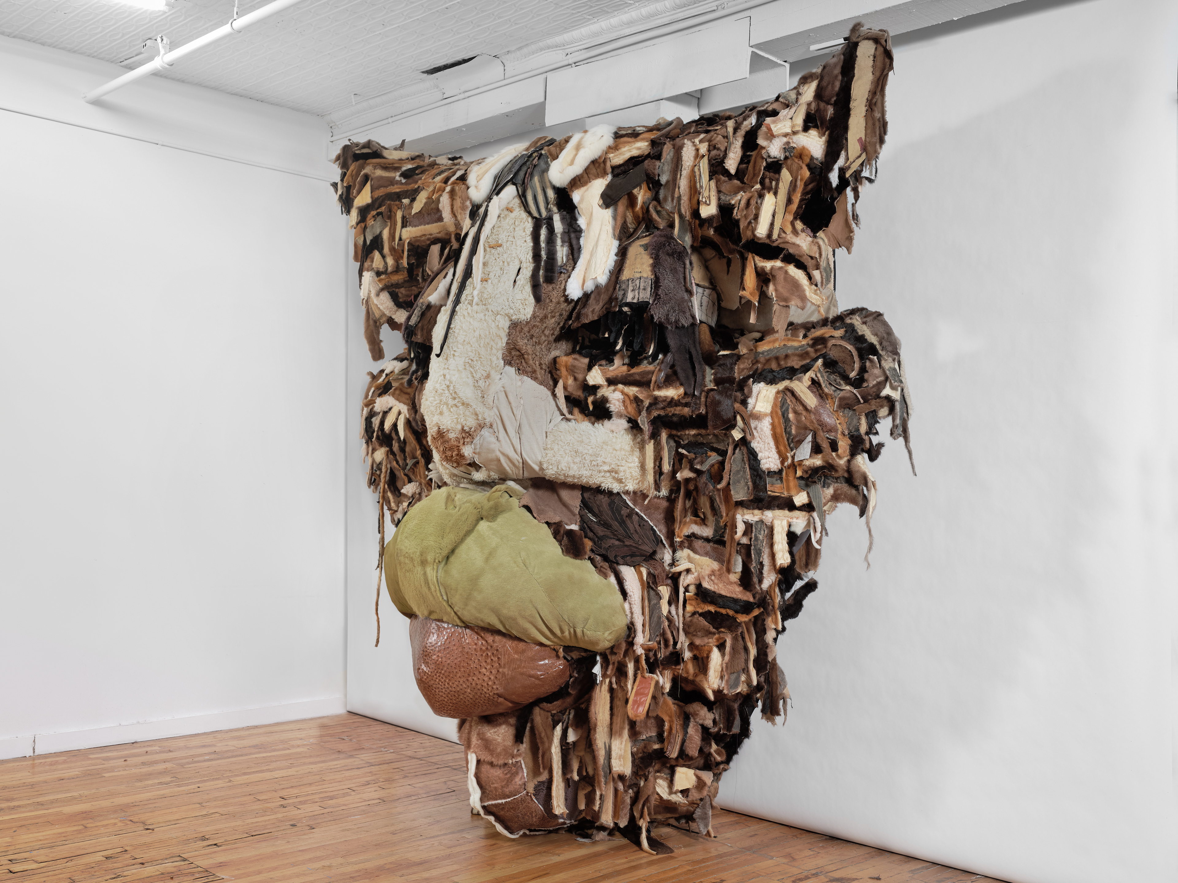 Angelus Mortem, 2022 Recycled Leather, Acrylic Paint, Coated Nylon, Steel Armature. 123 x 113 x 47.5 in (312.42 x 287.02 x 120.65 cm)