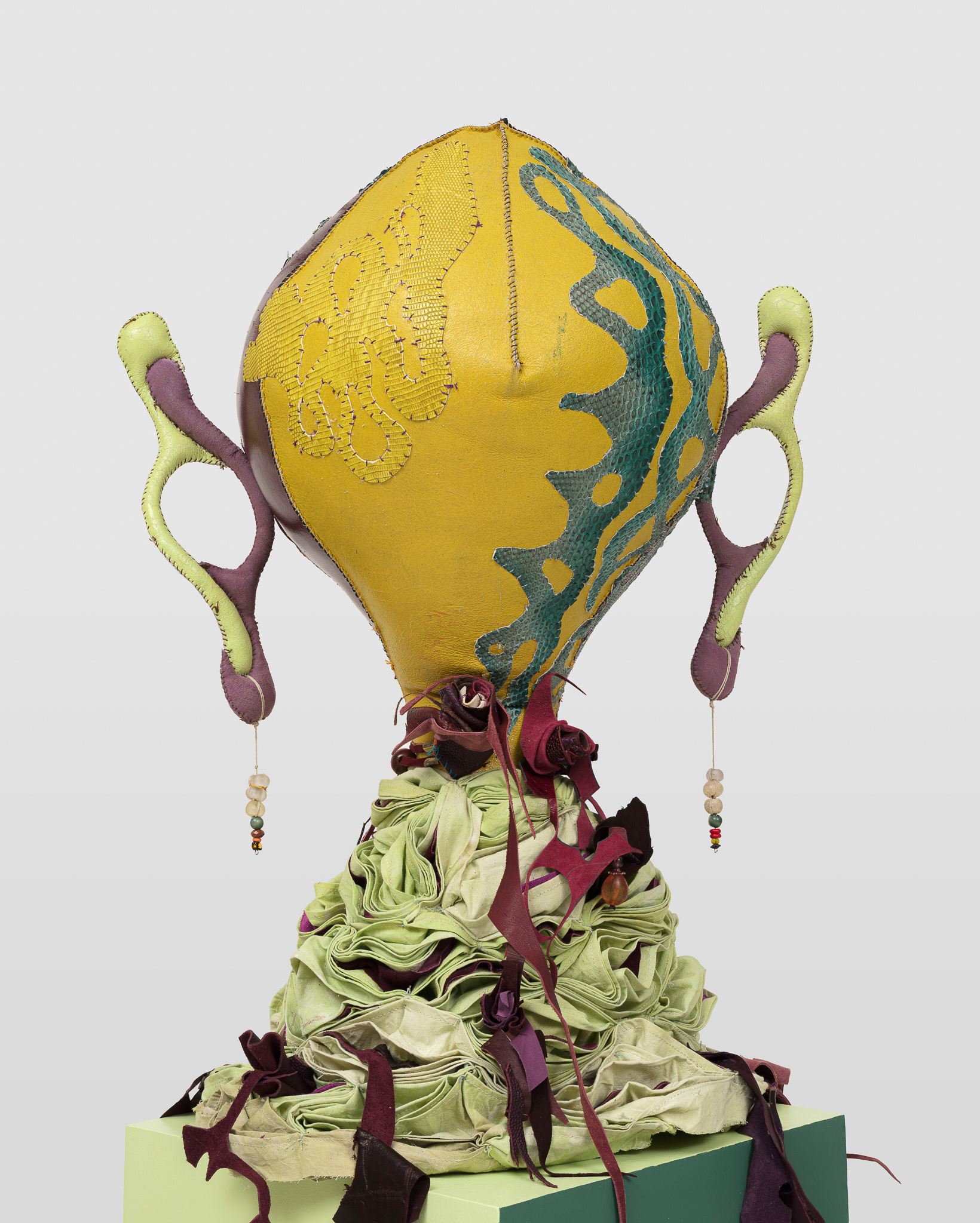 (detail) Mars cazimi in Scorpio, 2023, steel, wood, enamel paint, acrylic paint, leather dye and finisher, repurposed leather, suede and snake skin, repurposed fabric, shells, assorted found beads, twine, and coated nylon thread, 66H x 16 x 16 inches