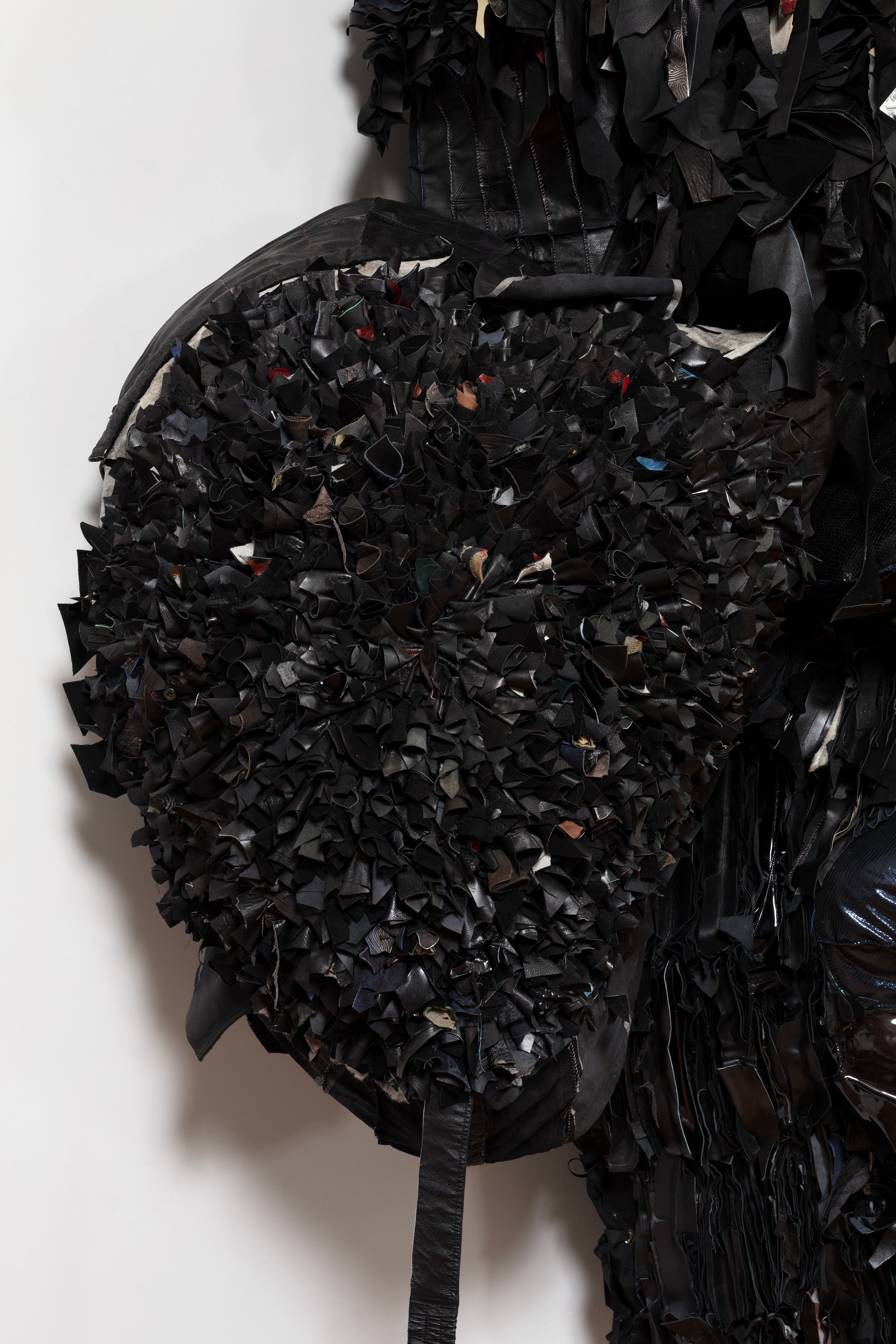 Sol Niger (With my fire, I may destroy everything, by my breath, souls are lifted from putrified earth), 2022 Recycled Leather, Acrylic Paint, Coated Nylon, Steel Armature. 125 x 84 x 49 in (317.5 x 213.36 x 124.46 cm)