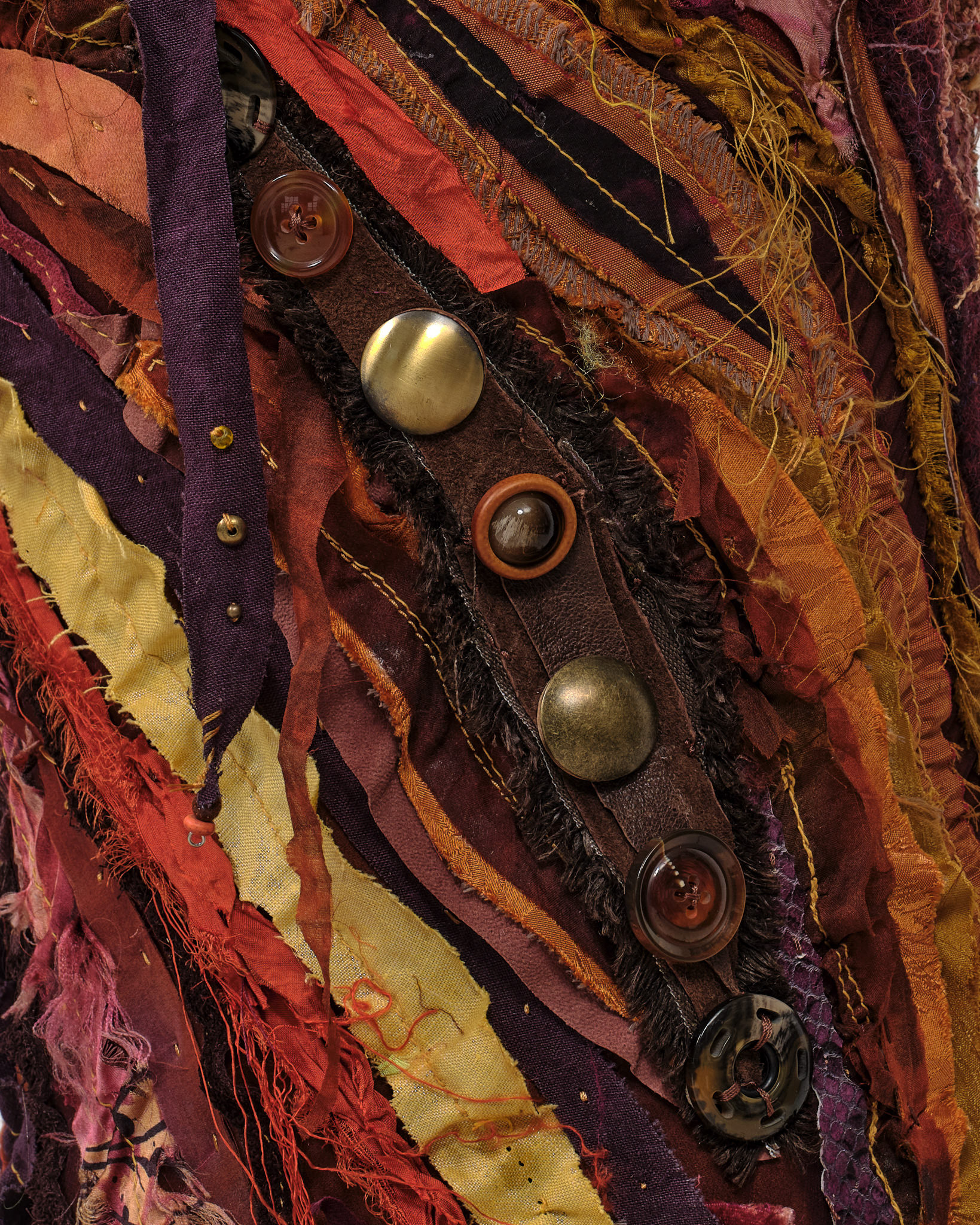 (detail) Blaze, 2024, Steel, enamel paint, acrylic paint and finisher, repurposed leather and fabric, assorted beads and found objects, seashells, and coated nylon thread, 73 1/2H x 49 x 50 1/2 inches