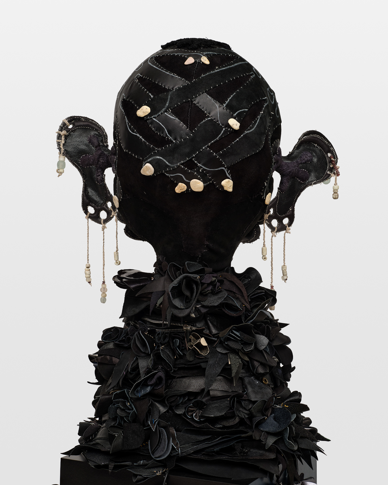 (detail) Lilith, 2024, Steel, wood, enamel paint, acrylic paint, , repurposed leather and suede, repurposed shearling, beads, stones, and coated nylon thread, 72 1/2H x 17 x 15 inches