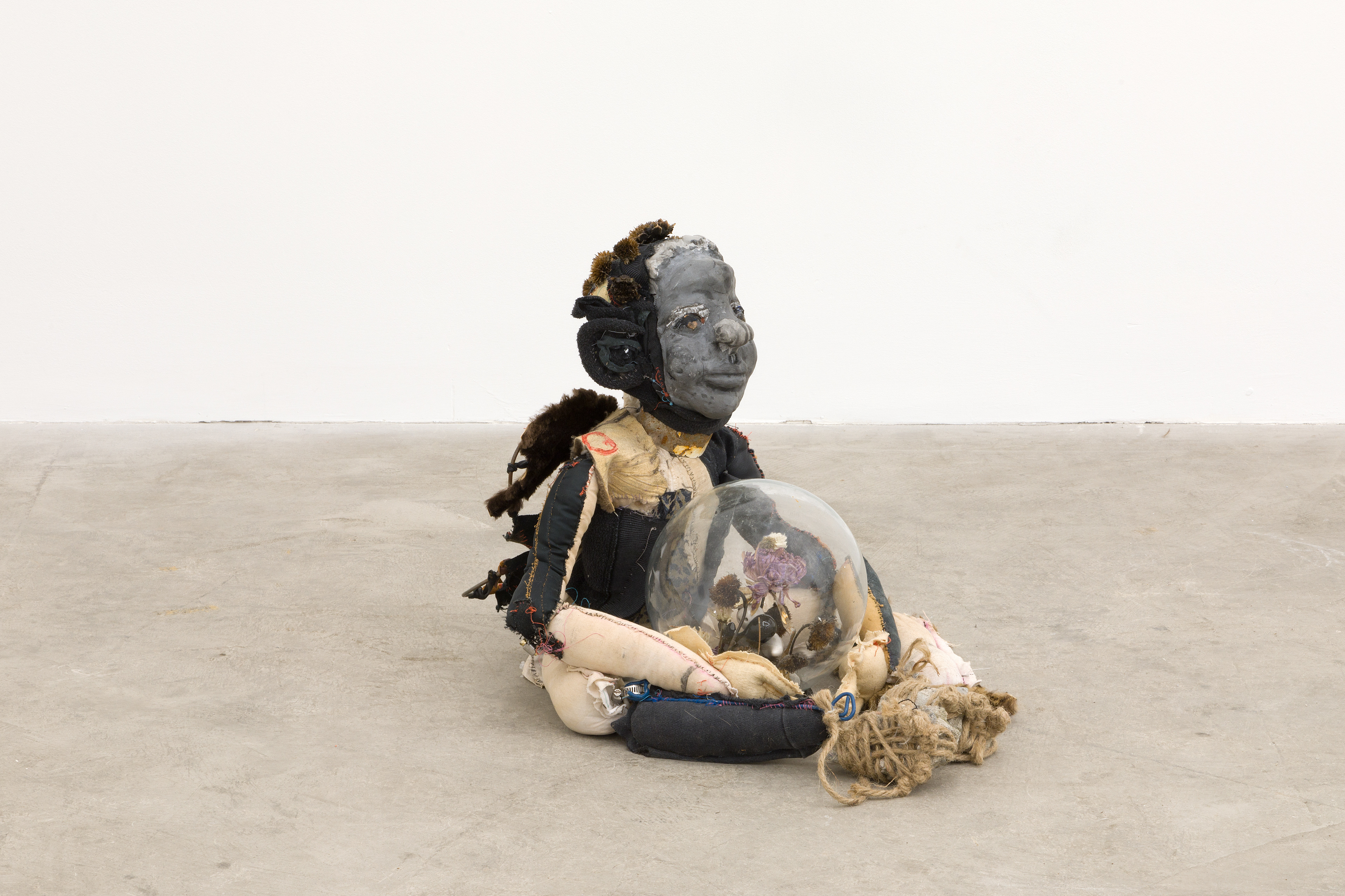 Baby bumblebee (for the betterment of us all please remember your smallness) 2018. Hand sewn fabrics, furs and leathers, hand carved plaster, acrylic paint, wire, stones, dried flowers, concrete, glass ball, salt and pepper shakers, cotton batting. 16 x 18 x 18 in (40.64 x 45.72 x 45.72 cm).