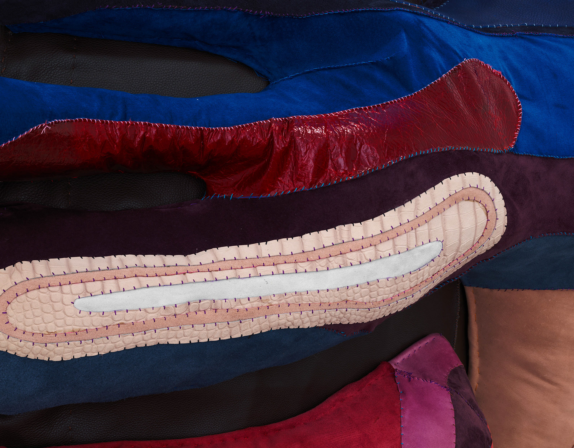 (detail) Homonoia, 2022, Steel, enamel paint, acrylic paint and finisher, repurposed leather and suede, organic cotton twill, and coated nylon thread, 88 1/2 x 68 x 26 1/4 inches