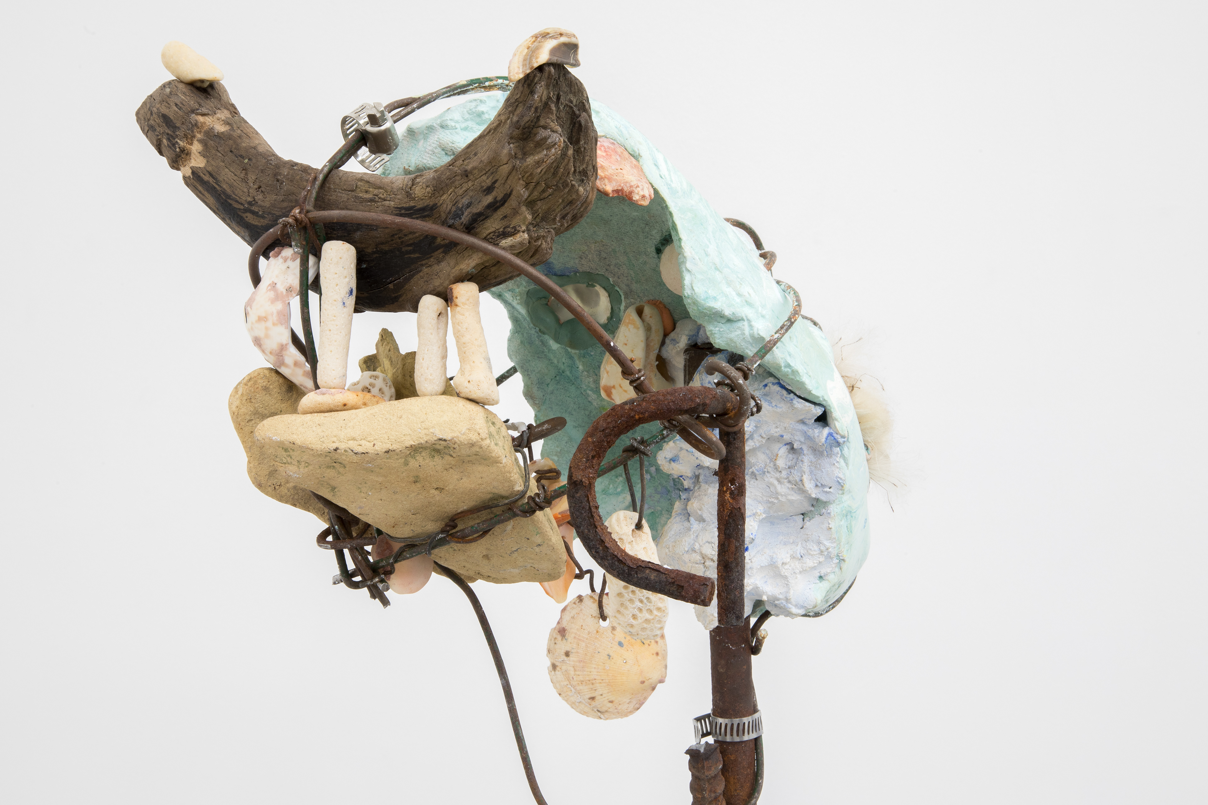 Precious things (everything), 2017. Hand carved plaster, stone, brick, reef stone, seashells, sea glass, milk thistle seeds, wire, acrylic paint, driftwood, rebar, concrete.