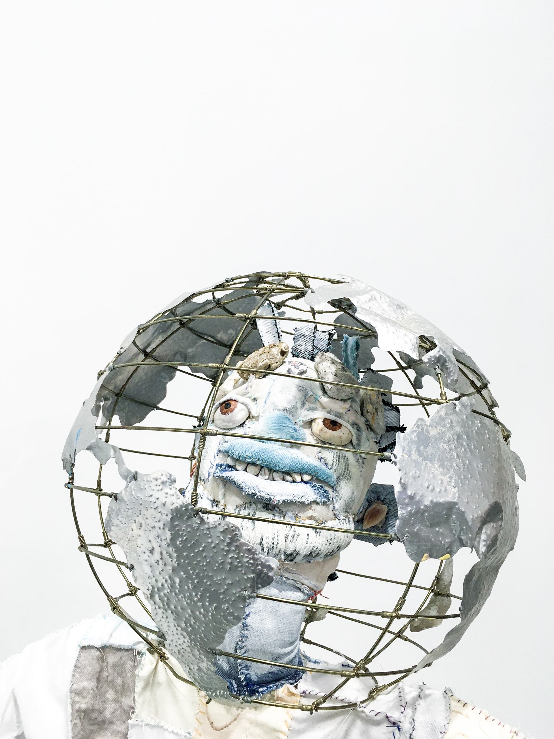 The Octonaut (I can be my own hands to hold), 2019. Recycled fabrics, concrete, pipe, acrylic paint, metal globe, wire, stones, seashells, plaster, hardware, recycled poly fibres. 51.5 x 37 x 35 in (130.8 x 94 x 88.9 cm).