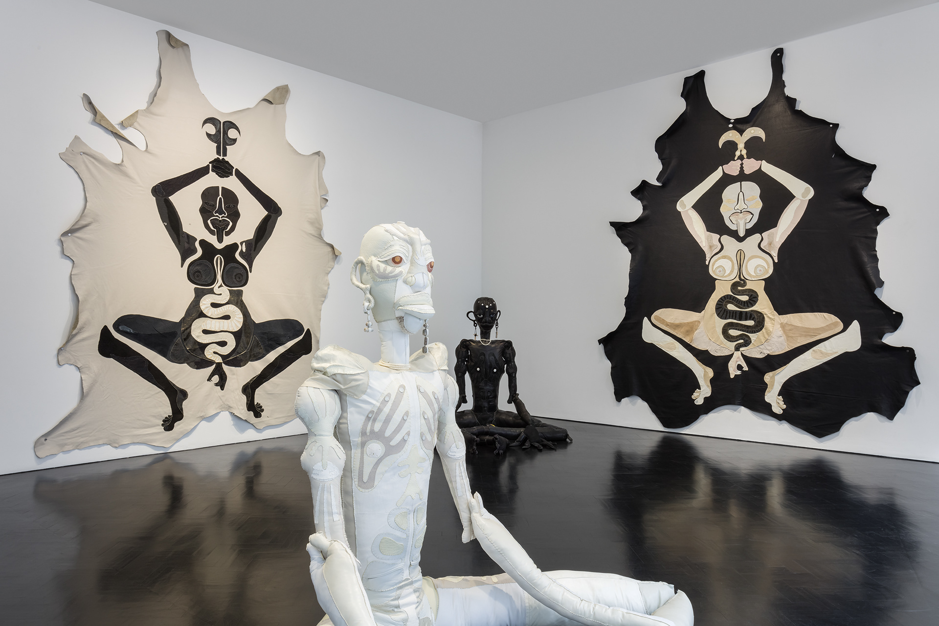Installation view. The leg of the hen, 2020 (left), Dumah, 2021 (foreground), Harmony, 2021 (background), and sword of war, 2020 (right)