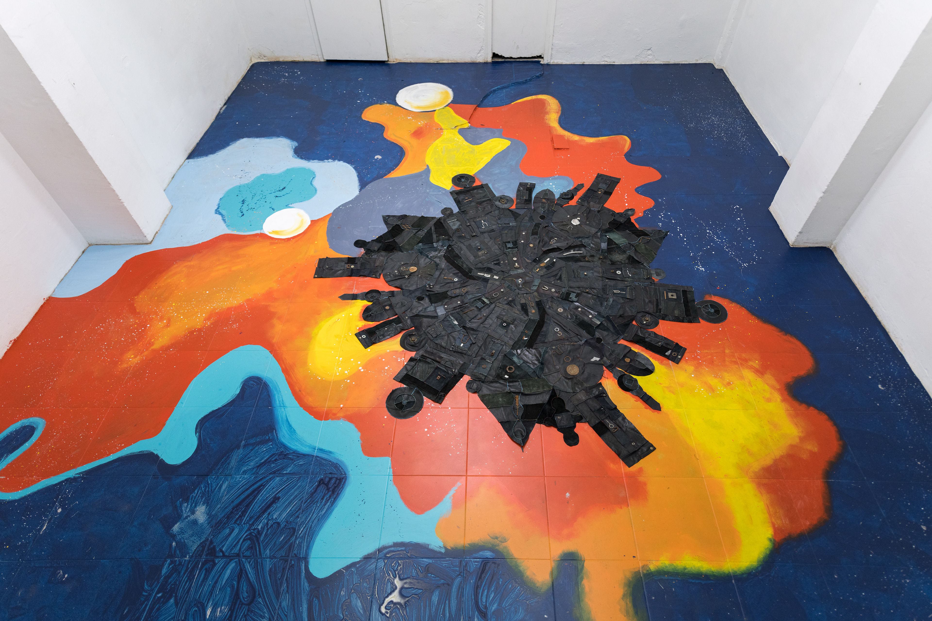 I heard a heartbeat down in the black hole, 2019. Recycled leather, found metal. Dimensions variable.