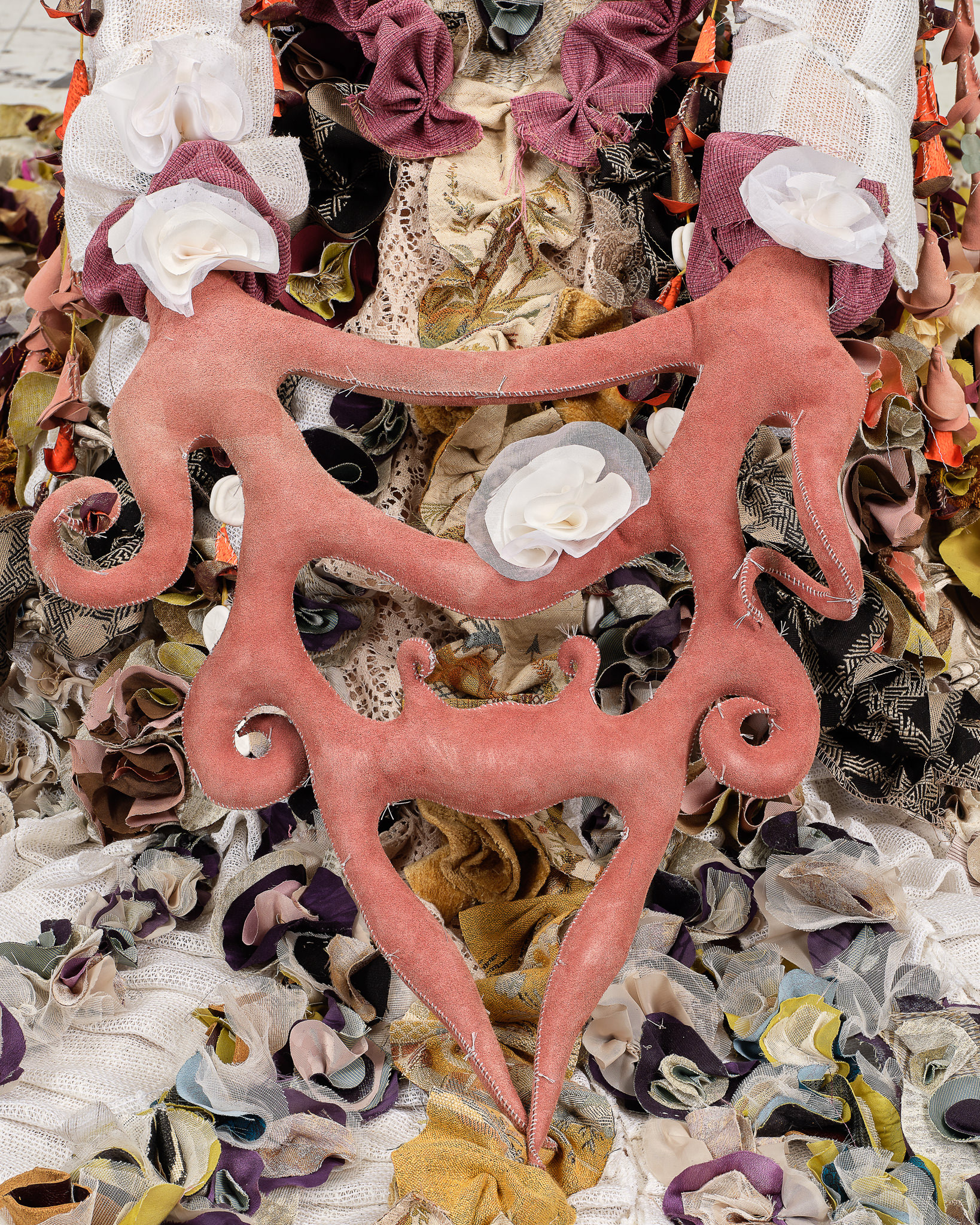 (detail) Fantasia, 2024, Repurposed leather, suede and assorted fabric; acrylic paint and finisher; stones; seashells; sand dollars; beads; armature wire; assorted found objects; jute and hemp twine; PVC; and coated nylon thread, Installation dimensions variable