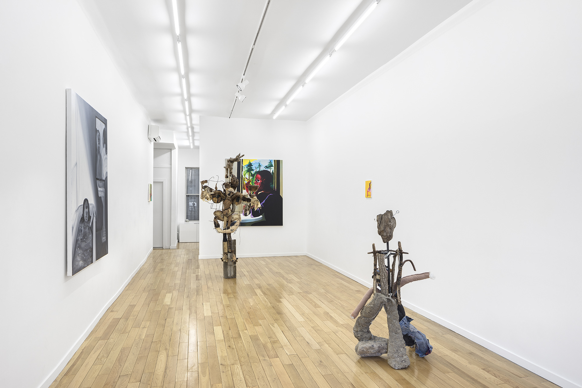 Installation view. Untitled (romantic dancing), 2017 (center) and pet rock, 2017 (right)