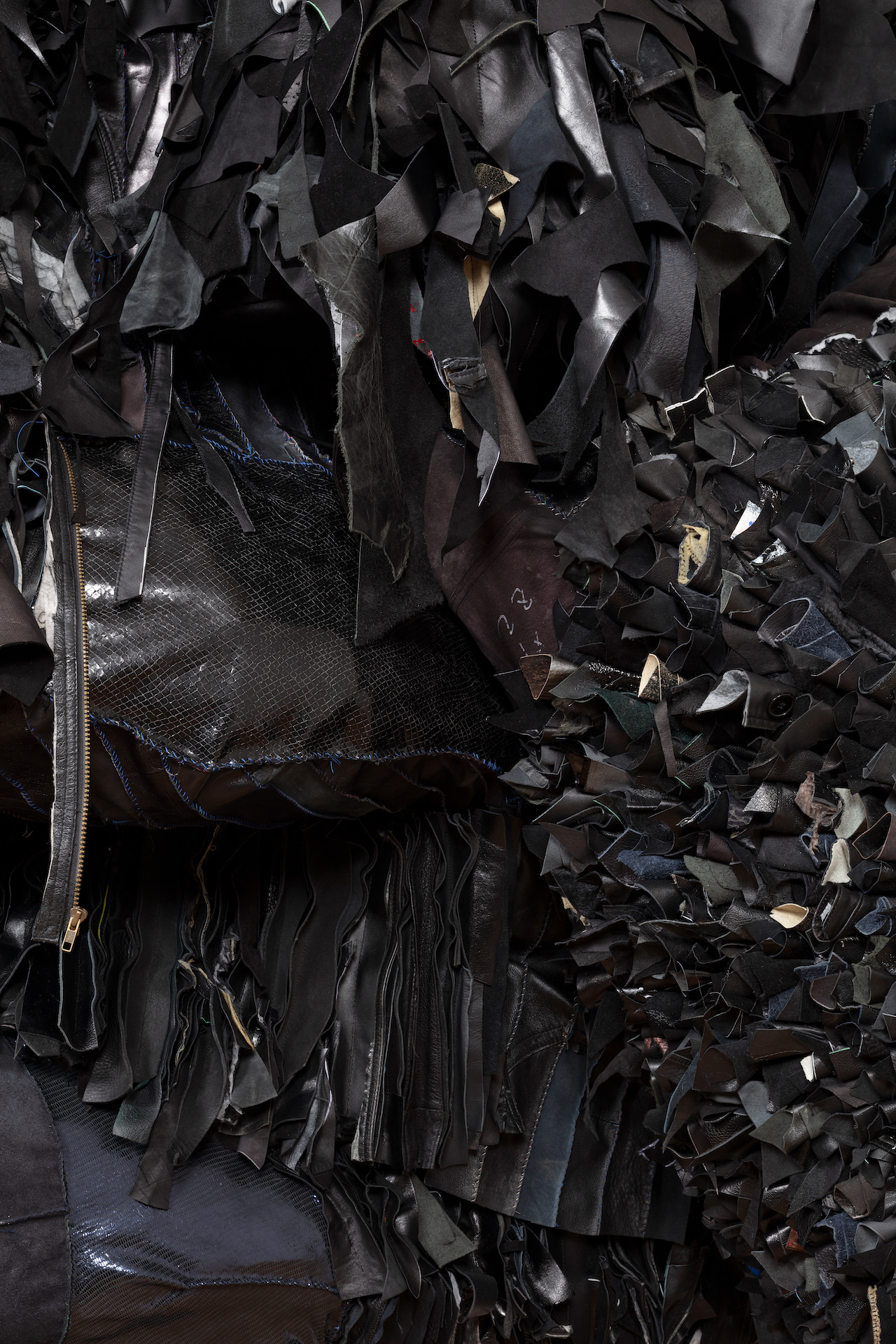 Sol Niger (With my fire, I may destroy everything, by my breath, souls are lifted from putrified earth), 2022 Recycled Leather, Acrylic Paint, Coated Nylon, Steel Armature. 125 x 84 x 49 in (317.5 x 213.36 x 124.46 cm)
