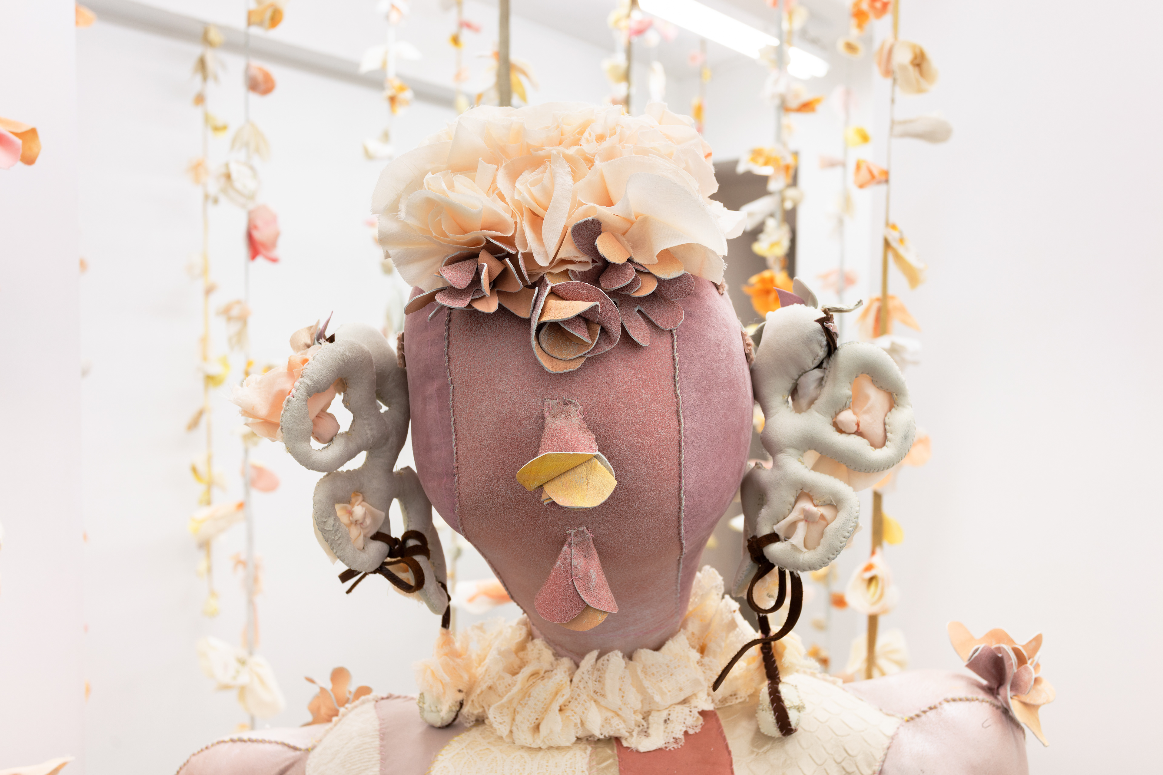 Delight, 2020. Various recycled and hand dyed fabrics, recycled leather, cotton and recycled polyester batting, acrylic paint, PVA glue, seashells, stones, beads, pipe, wooden chair, hand sewn. 52 x 36 x 36 in (132.1 x 91.4 x 91.4 cm).