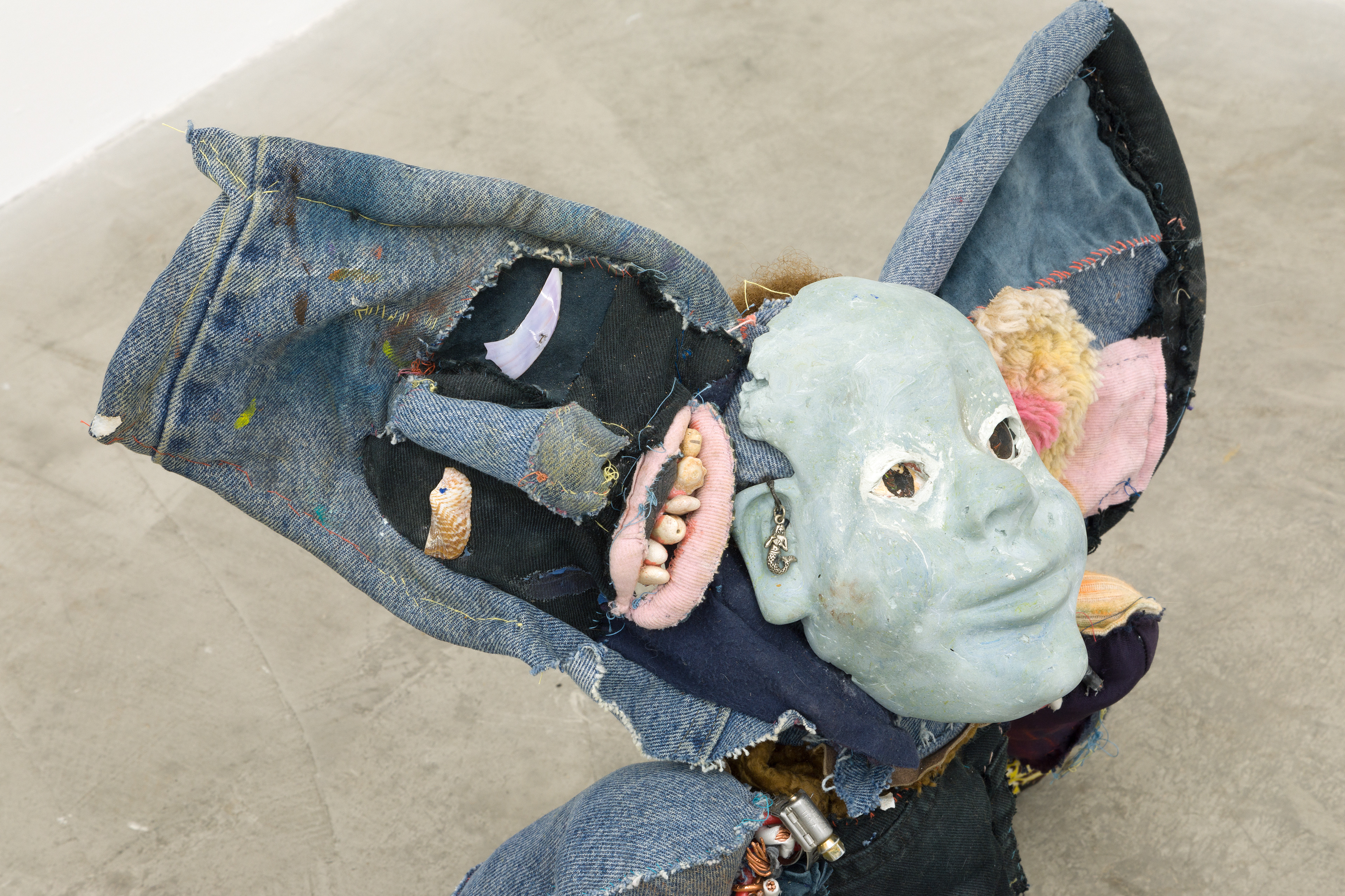 'friendliness and the whisperers', 2018. Hand sewn fabrics, furs and leathers, hand carved plaster, acrylic paint, chalk pastel, wires, hardware, cotton batting, polyester batting, human hair, sea shells, stones. 21 x 40 x 28 in (53.3 x 101.6 x 71.1 cm).