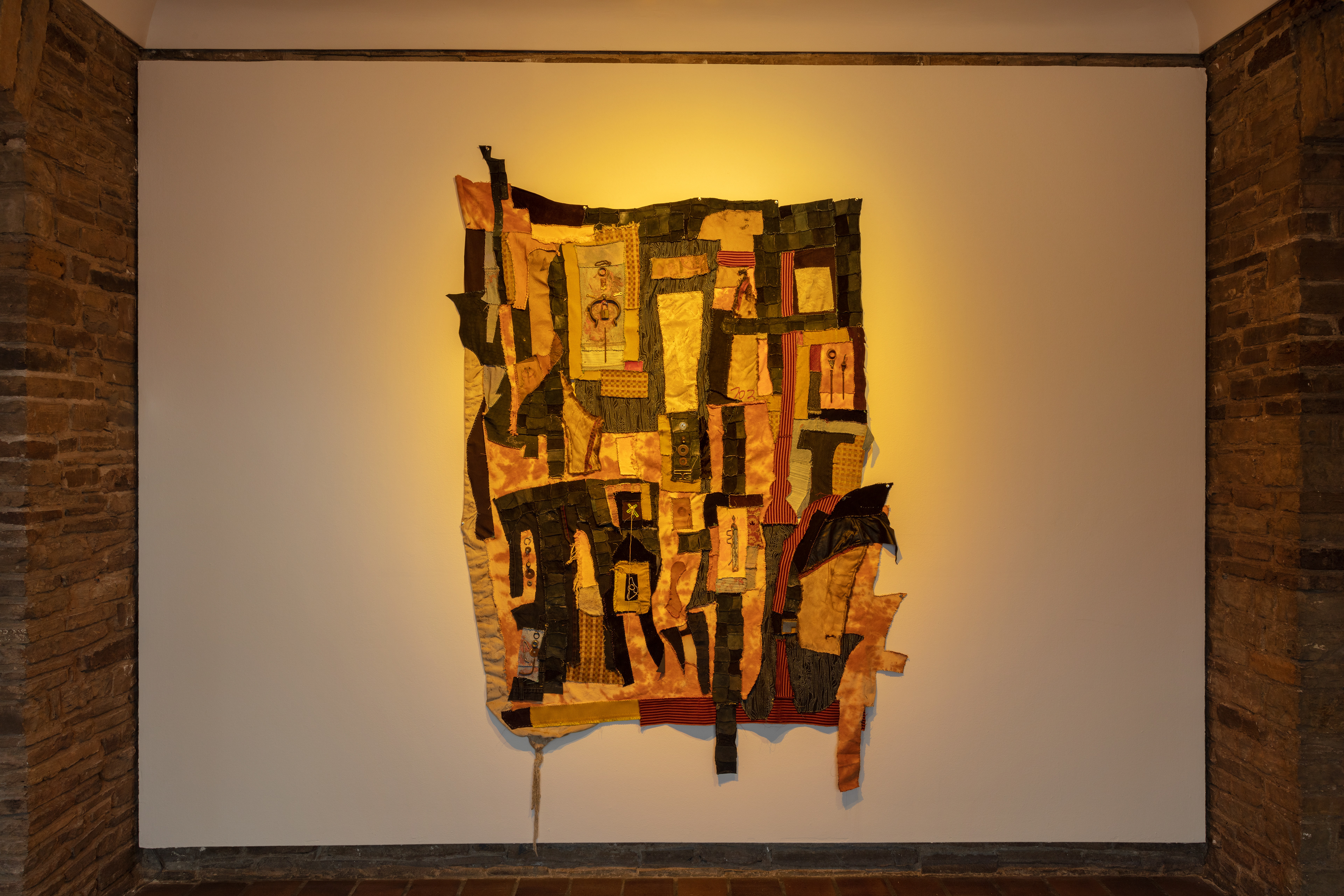 Sparkle and Sparkle’s map home, 2018. Recycled fabrics, rawhide, leather, carved plaster, acrylic paint, wire, hardware, jute, found objects, stones, found photographs, chair. Sparkle: 44 x 18 x 24 in (111.8 x 45.7 x 61 cm) Sparkle’s map home: 72 x 51 in (182.9 x 129.5 cm).