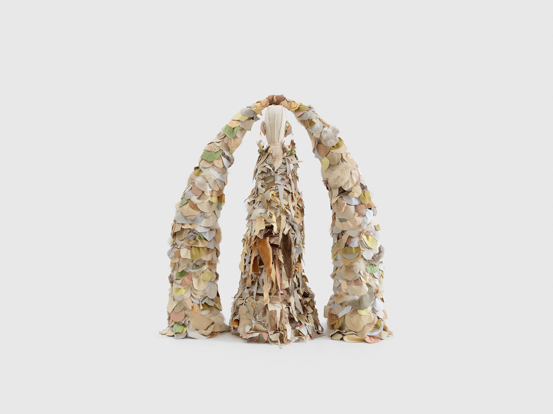 Ivory Gate, 2022, Steel, enamel paint, acrylic paint and finisher, repurposed leather, fur, suede, shearling, conch shells, snake skin, chalk pastel, organic cotton twill, and coated nylon thread, 61 1/4 x 59 1/2 x 30 inches