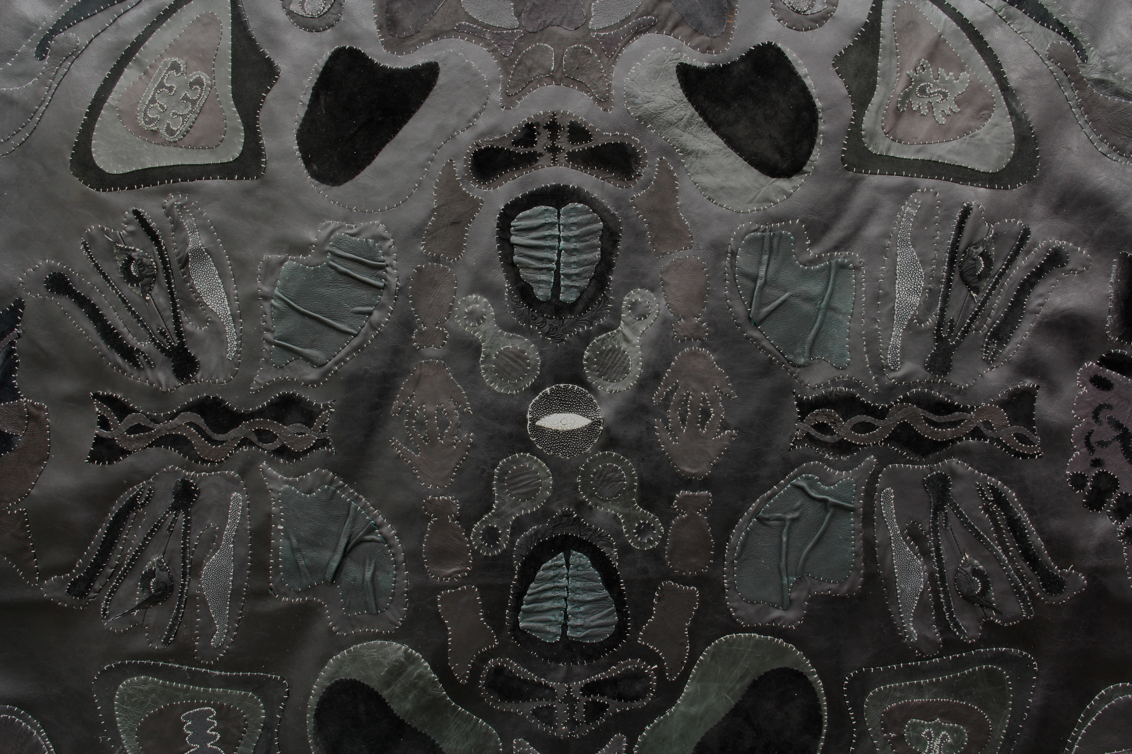 The Tongue and the Teeth, 2020. Recycled fabric, recycled leather, acrylic paint, stones, seashells. 70 x 70 in (27.56 x 27.56 cm).