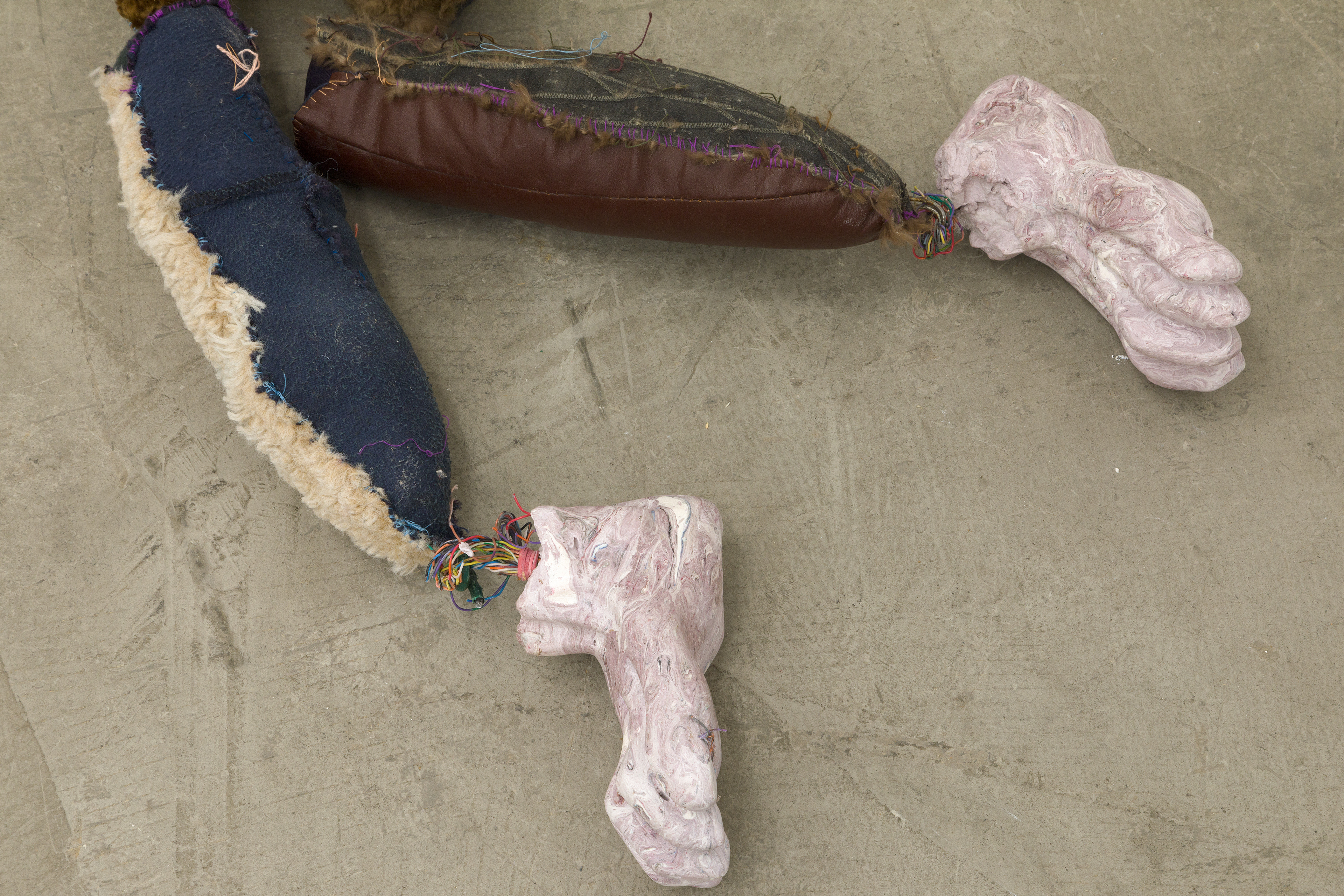 Earnest Lewis King 2017-2018. Hand carved plaster, acrylic paint, hand sewn fabric, leather, fur, jute, paint can, wire, hardware, stones, seashells, chalk pastel, human hair, cotton batting, polyester bating. 10 x 70 x 18 in (25.4 x 177.8 x 45.7 cm).