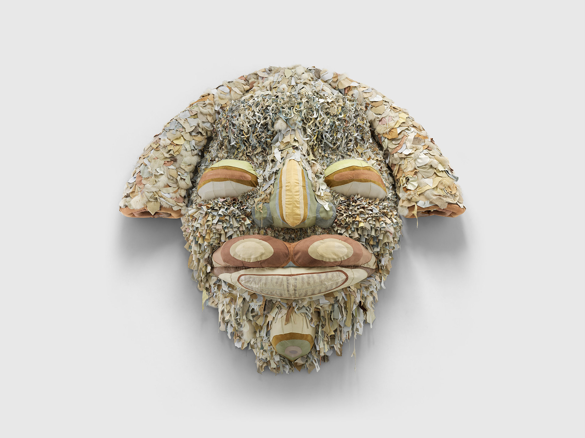 Ivory Gate, 2022, Steel, enamel paint, acrylic paint and finisher, repurposed leather, suede, fur, shearling, snake skin, shells, fossilized teeth, organic cotton twill, and coated nylon thread, 124 1/2 x 137 1/8 x 37 1/2 inches
