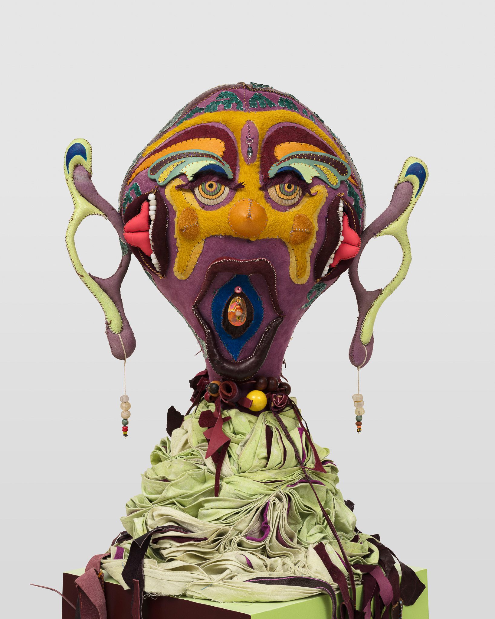 (detail) Mars cazimi in Scorpio, 2023, steel, wood, enamel paint, acrylic paint, leather dye and finisher, repurposed leather, suede and snake skin, repurposed fabric, shells, assorted found beads, twine, and coated nylon thread, 66H x 16 x 16 inches