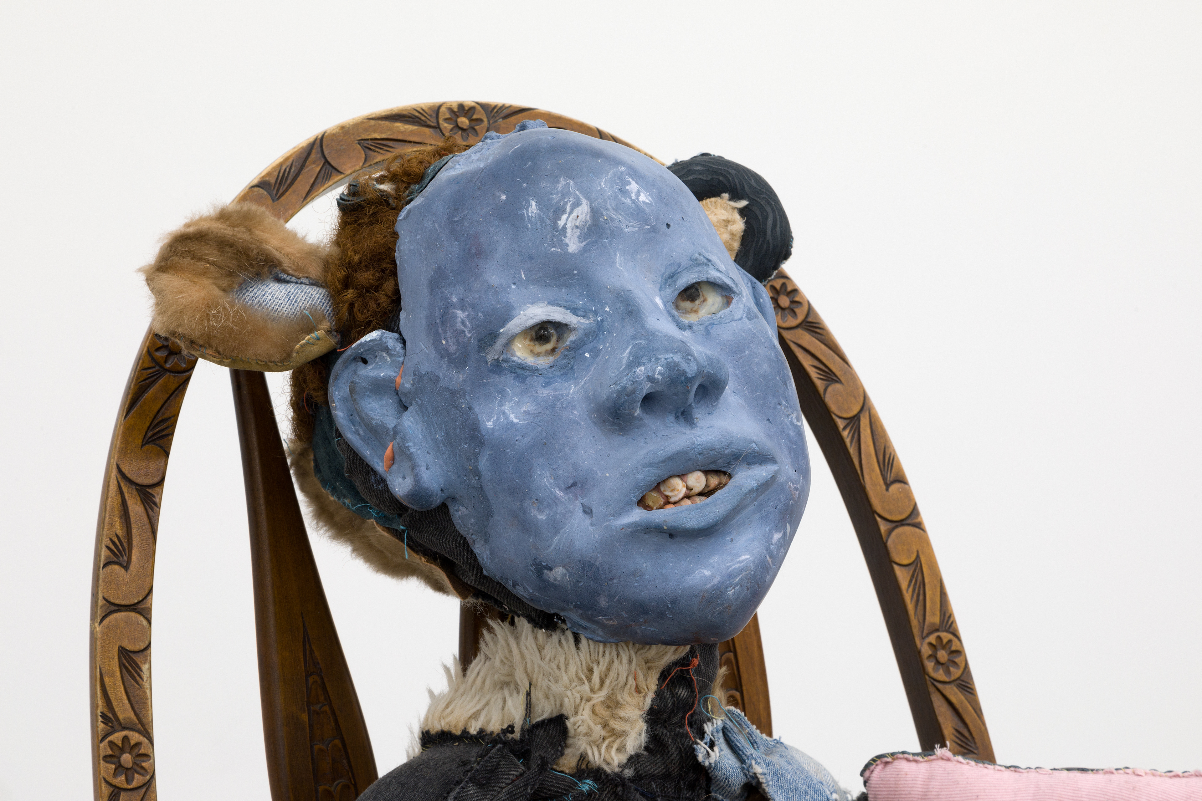 Unity (Negros Historical Information Systems in Every Dark Corner). 2018. Hand carved plaster, wire, hand sewn fur, leather, fabric, seashells, stones, cotton batting, polyester batting, human hair, acrylic paint, chalk pastel. Dimensions variable.
