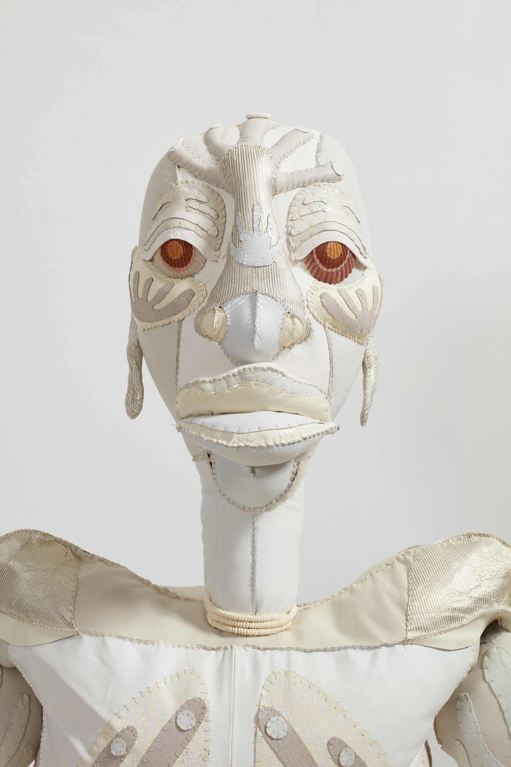 "Tau Lewis, Dumah, 2021. Recycled leather, recycled polyester fibres, sand dollars, acrylic paint, pvc pipe, wire, crinoid fossils, sea shells. 52 x 58 x 64 in (132.1 x 147.3 x 162.6 cm)."