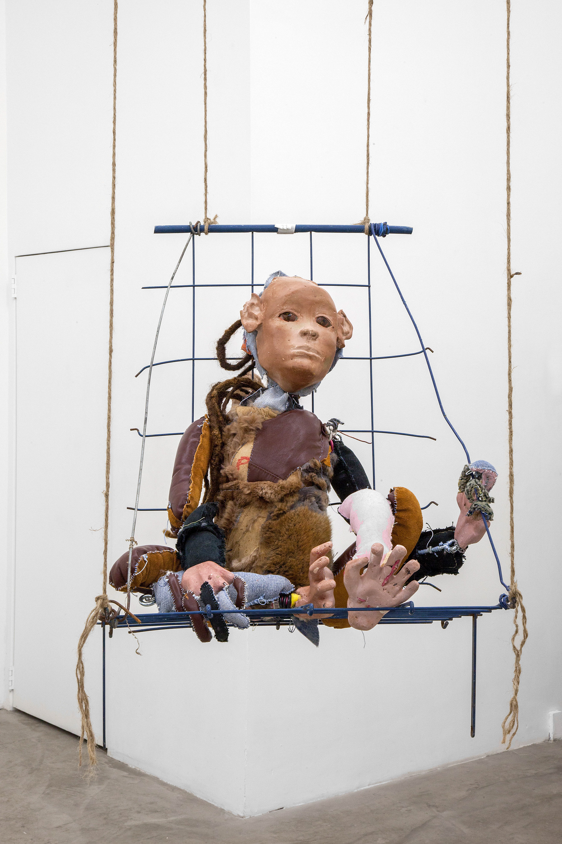 something joyful, 2017. Plaster, wire, fur, leather, fabric, pillow stuffing, stones, human hair, acrylic paint, shopping basket, jute. 67 x 20 x 32 in (170.2 x 50.8 x 81.3 cm).
