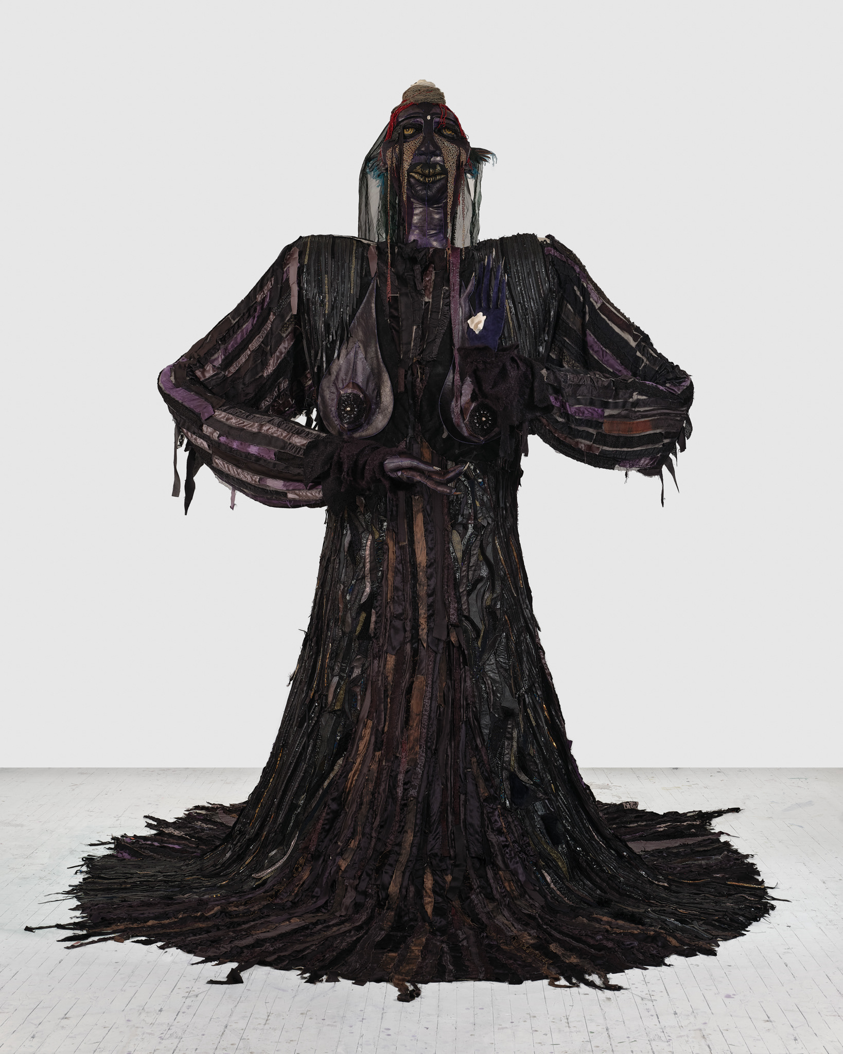 The Night Woman, 2024, Steel; enamel paint; acrylic paint and finisher; repurposed leather, suede, shearling, fur, shagreen, and assorted fabric; leather, fabric, and natural dyes; cow bone; conch; abalone shell; stones; jute; coated nylon thread; and coated cotton thread, 130H x 137 x 106 inches