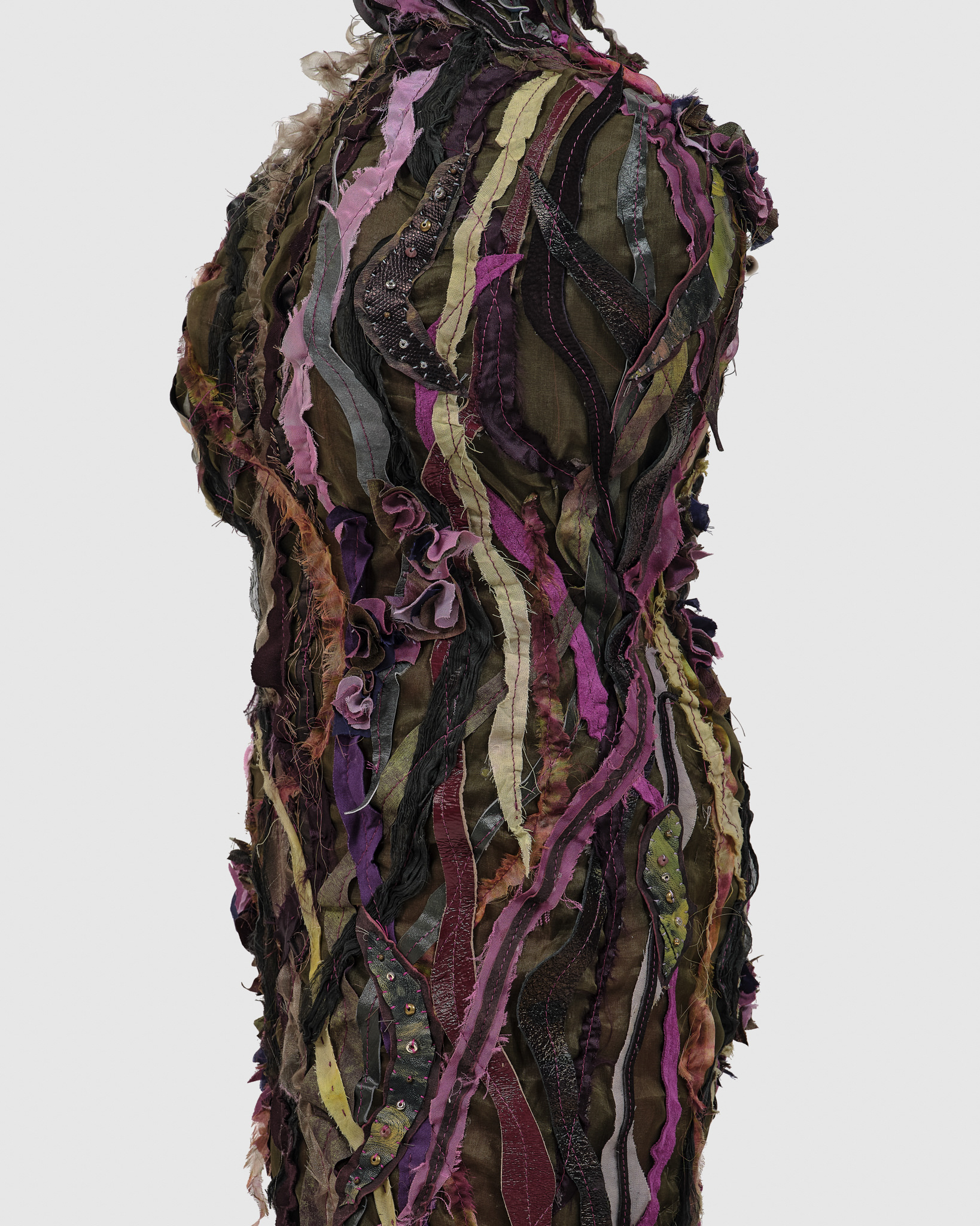 (detail) Genesis, 2024, Steel, enamel paint, acrylic paint and finisher, leather dye, repurposed leather and fabric, assorted beads, found stones, and coated nylon thread, 65H x 74 3/4 x 71 1/2 inches