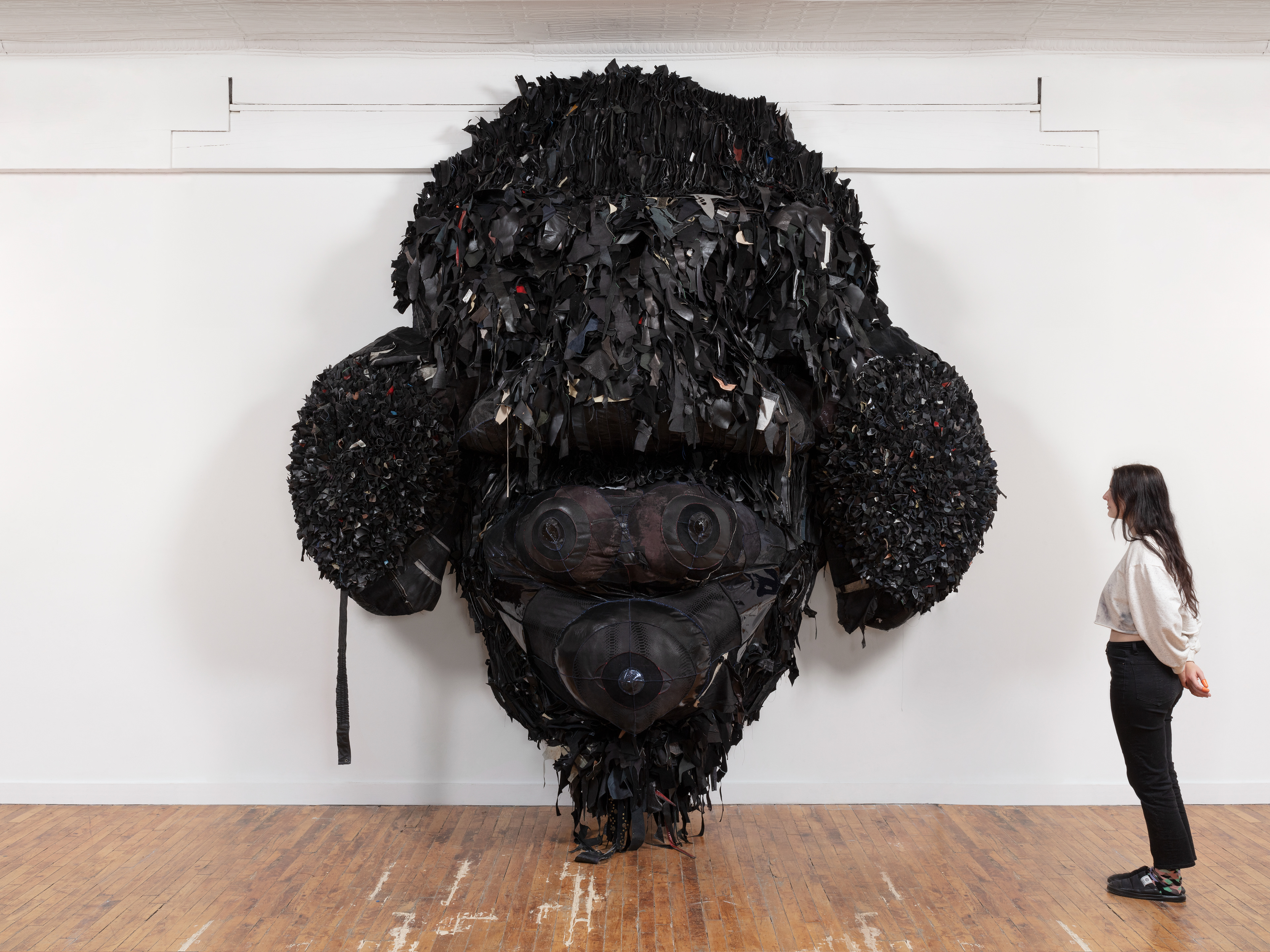 Sol Niger (With my fire, I may destroy everything, by my breath, souls are lifted from putrified earth), 2022 Recycled Leather, Acrylic Paint, Coated Nylon, Steel Armature. 125 x 84 x 49 in (317.5 x 213.36 x 124.46 cm)