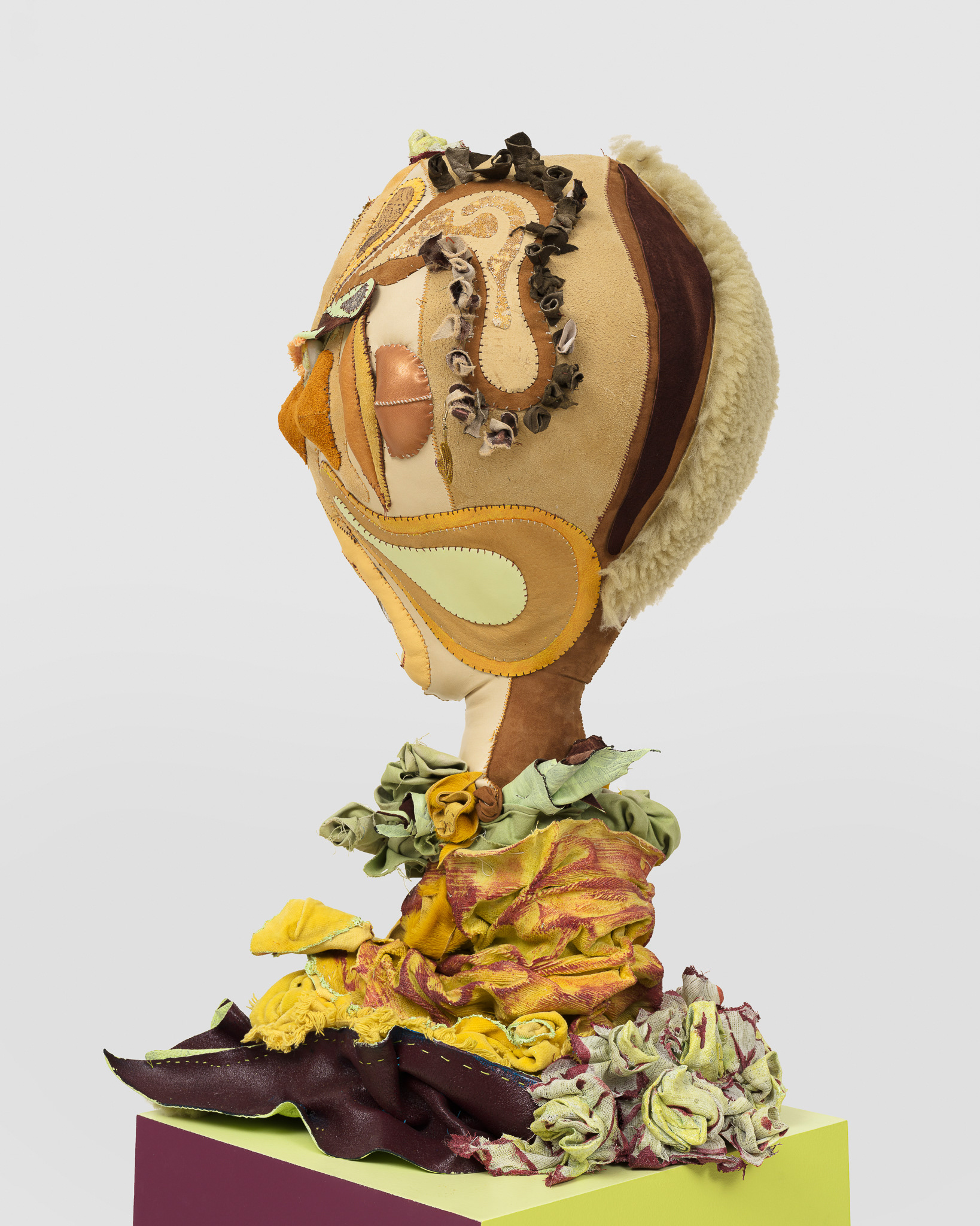(detail) Mercurial Virgin, 2023, Steel, wood, enamel paint, acrylic paint, leather dye and finisher, repurposed leather and suede, stones, ox bone beads and assorted found beads, twine, and coated nylon thread, 65 1/2H x 16 x 16 inches