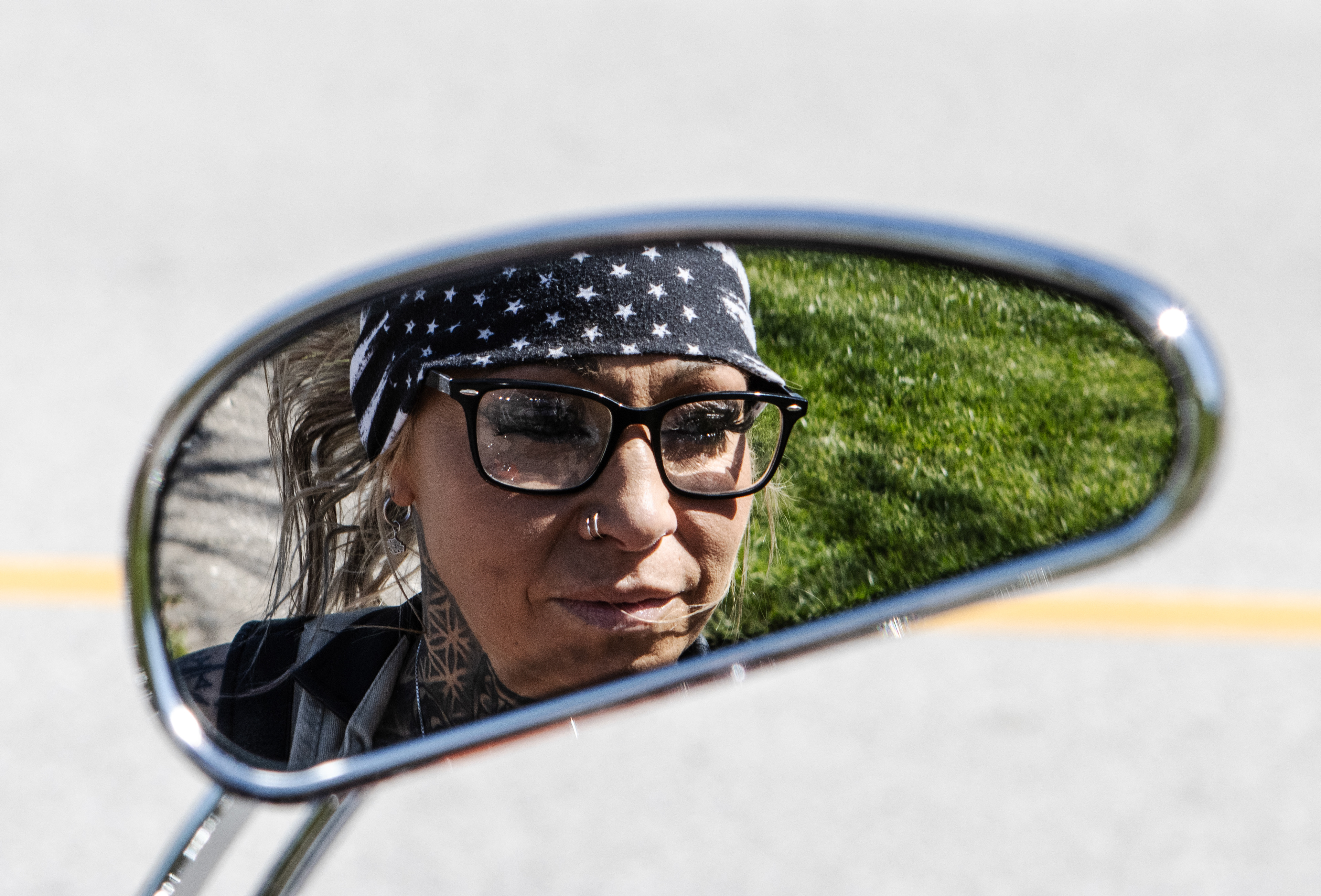 - Mandy Bell poses for a photo on her motorcycle in Alto Pass, Ill. on Saturday afternoon, April 13, 2024.