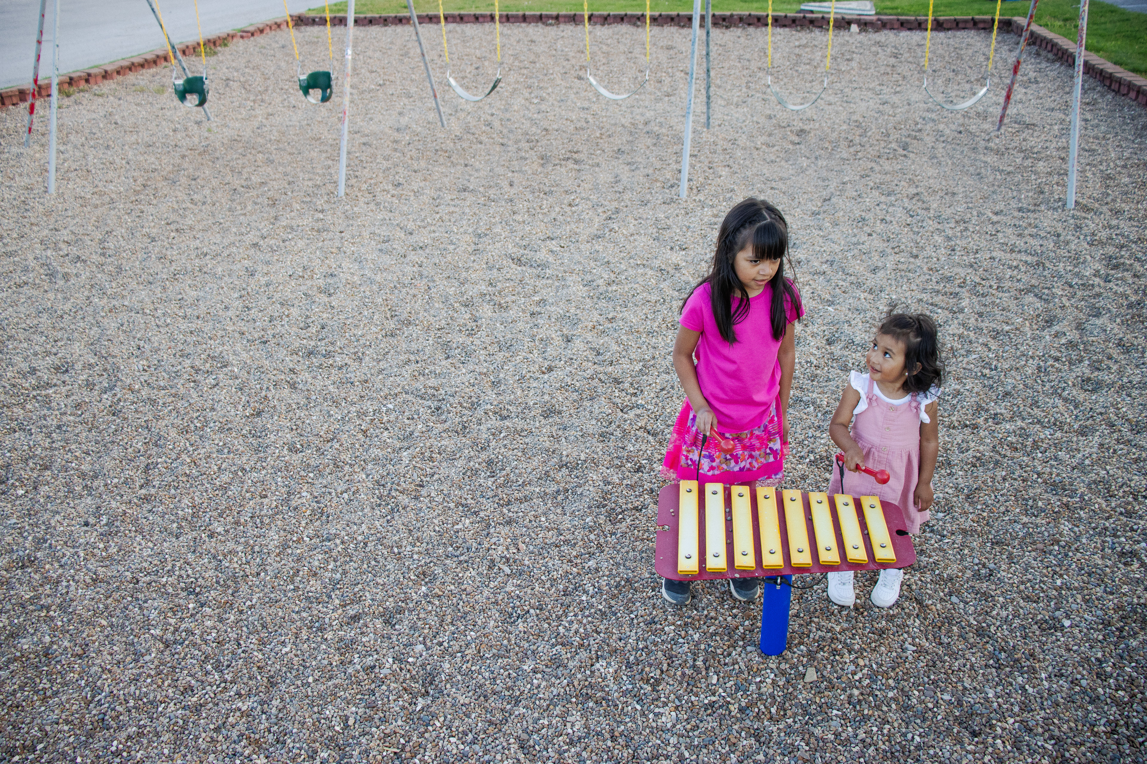 - 2-year-old Haily Cruz plays on the xylophone at the park in Cobden, Ill. on Saturday evening, April 13, 2024.