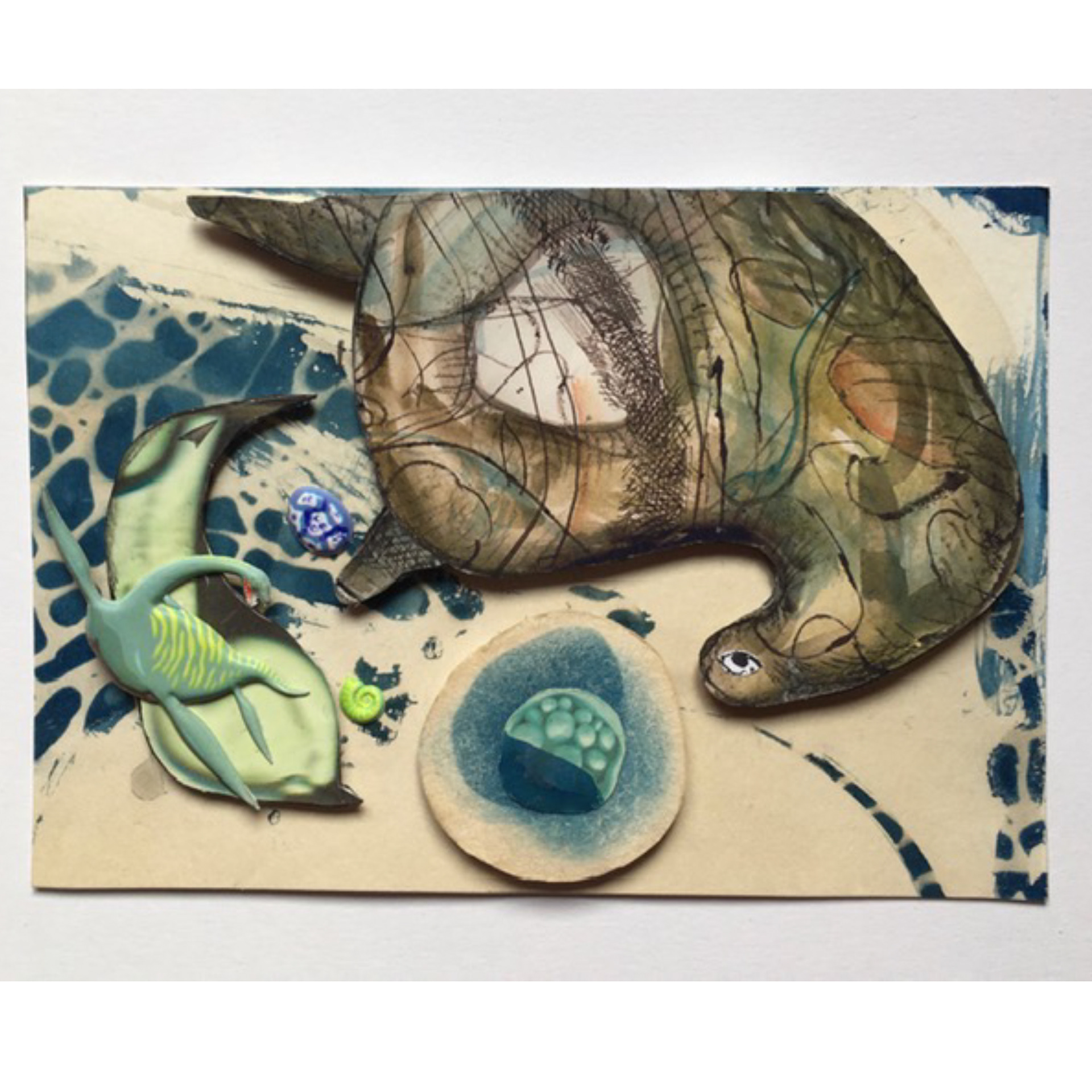 Curiosity – 2021, 4 x 6.5 x ¼”, cyanotype, ink, plastic dinosaur, printed matter