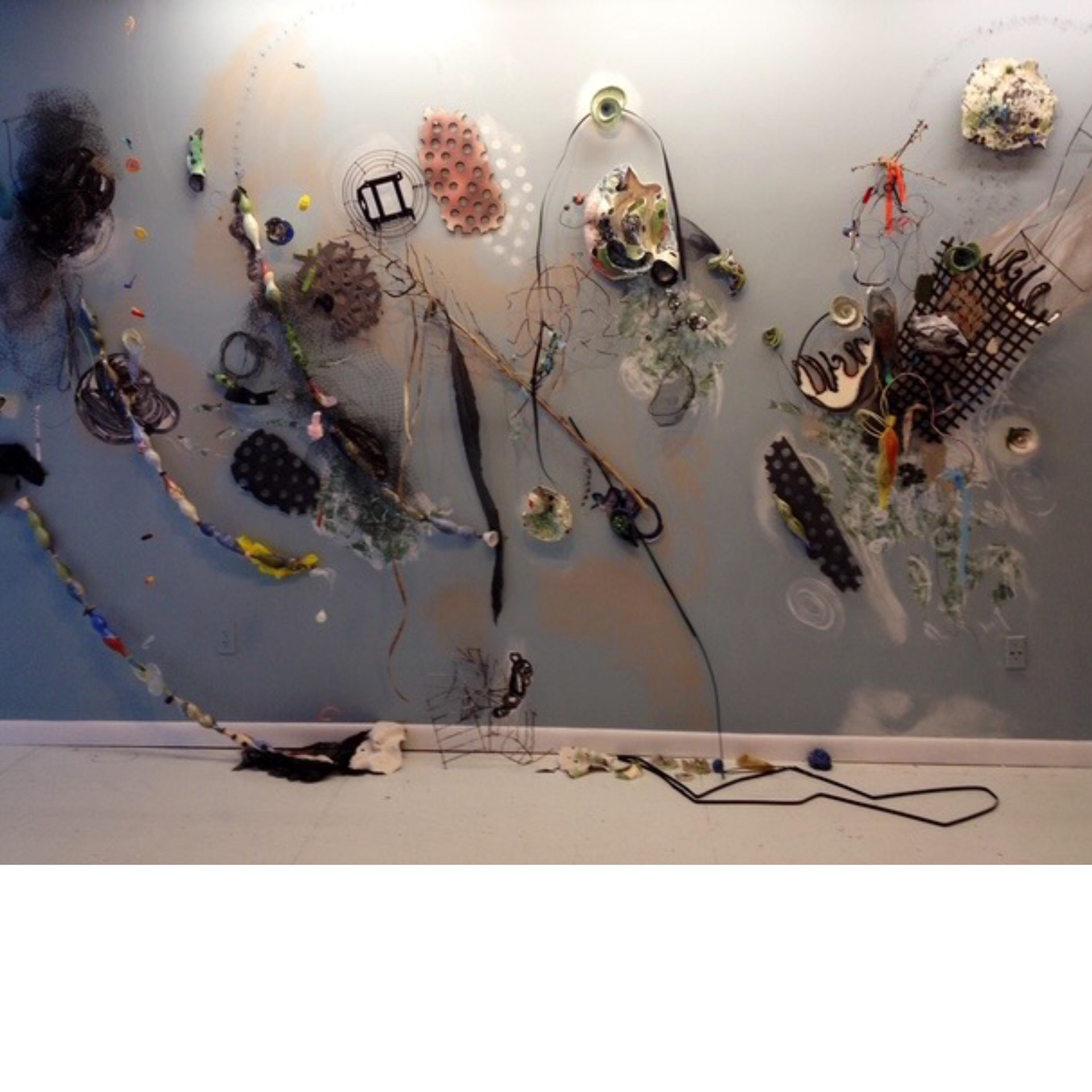 Cross Currents – 2013, ceramic, (inspired and concern by the Pacific Garbage Patch, wire, plastic, wood, paint, mesh, 7’ x 10’ x 3’, Gallery Ehva, Provincetown, MA.