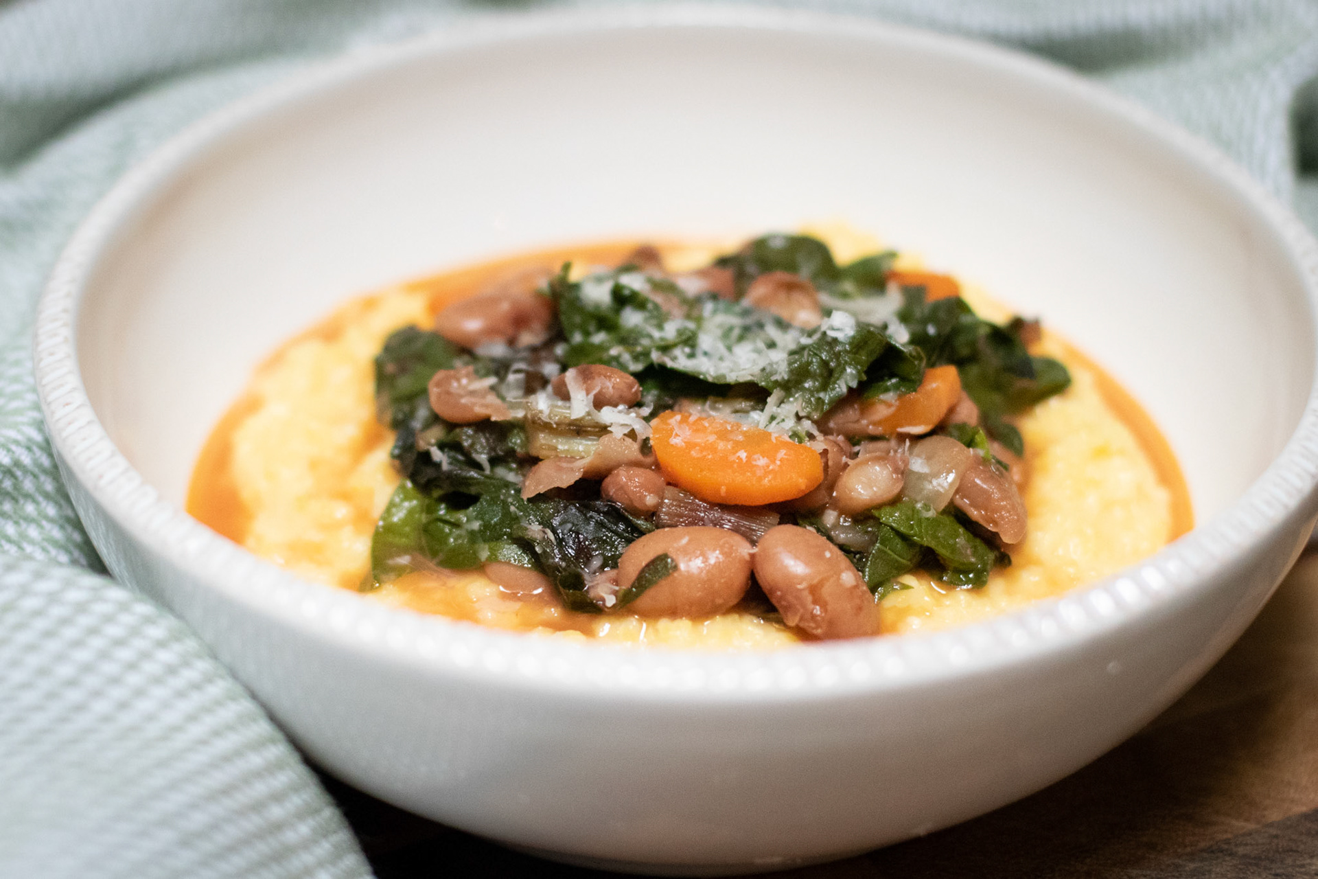 sauteed swiss chard and pinto beans on polenta